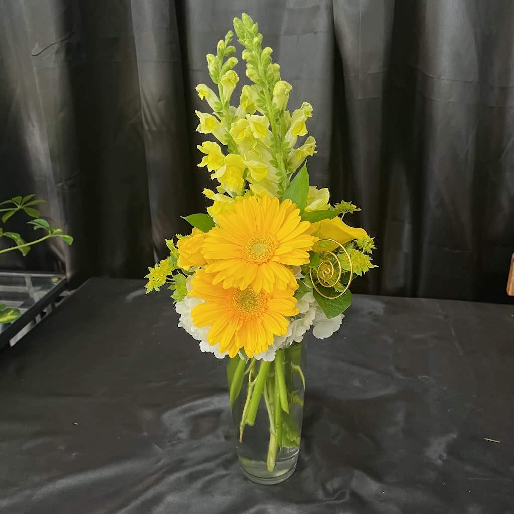 Sunburst - An arrangement with a mix of bright, Spring colors.