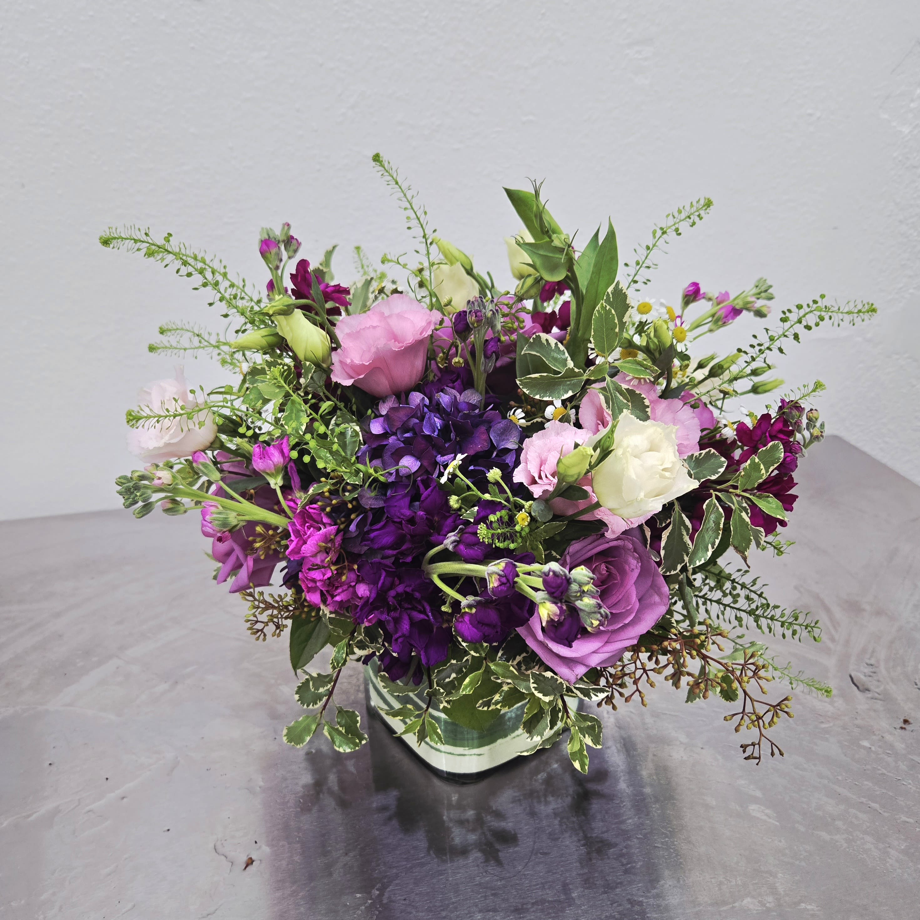 Garden Whispers - Beautiful delicate tones of purple and pinky lavender. Perfect for so many occasions. Created by The Impeccable Poppy in Sherman, TX