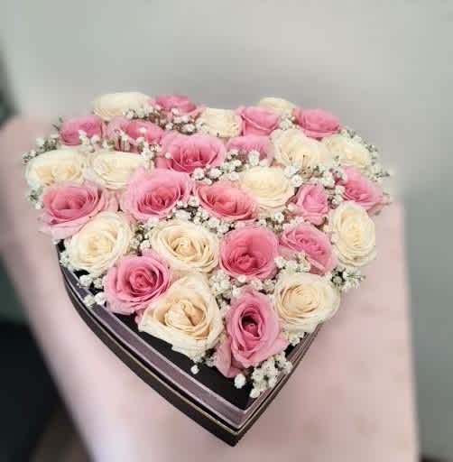 Black heart shape box with pink &amp; white roses by Xochitl EP (specify rose color combination) - black box with pink and white roses decorated with baby's breath and nice matching ribbon.   you  can change the color of the roses. 