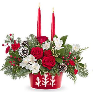 Evergreen Charm Centerpiece - Glow up your holiday table with Teleflora's Evergreen Charm Centerpiece. Red roses, white alstroemeria, and evergreens shine in Teleflora's Snowy Pines Dish with glowing red candles-perfect for Christmas dinners or winter celebrations.  Features red roses, white alstroemeria, and red miniature carnations. Accented with cedar, variegated holly, noble fir, and salal, with two red candles in Teleflora's Snowy Pines Dish (while supplies last).