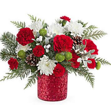 Christmas Magic Bouquet - Teleflora's Christmas Magic Bouquet sparkles with red and green blooms, festive evergreens, and pinecones. Arranged in Teleflora's glittering Magical Wish Vase, it's a cheerful gift for celebrating the holiday season.  Features red carnations, red miniature carnations, green button spray chrysanthemums, and white cushion spray chrysanthemums. Accented with cedar and noble fir in Teleflora's Magical Wish Vase (while supplies last).