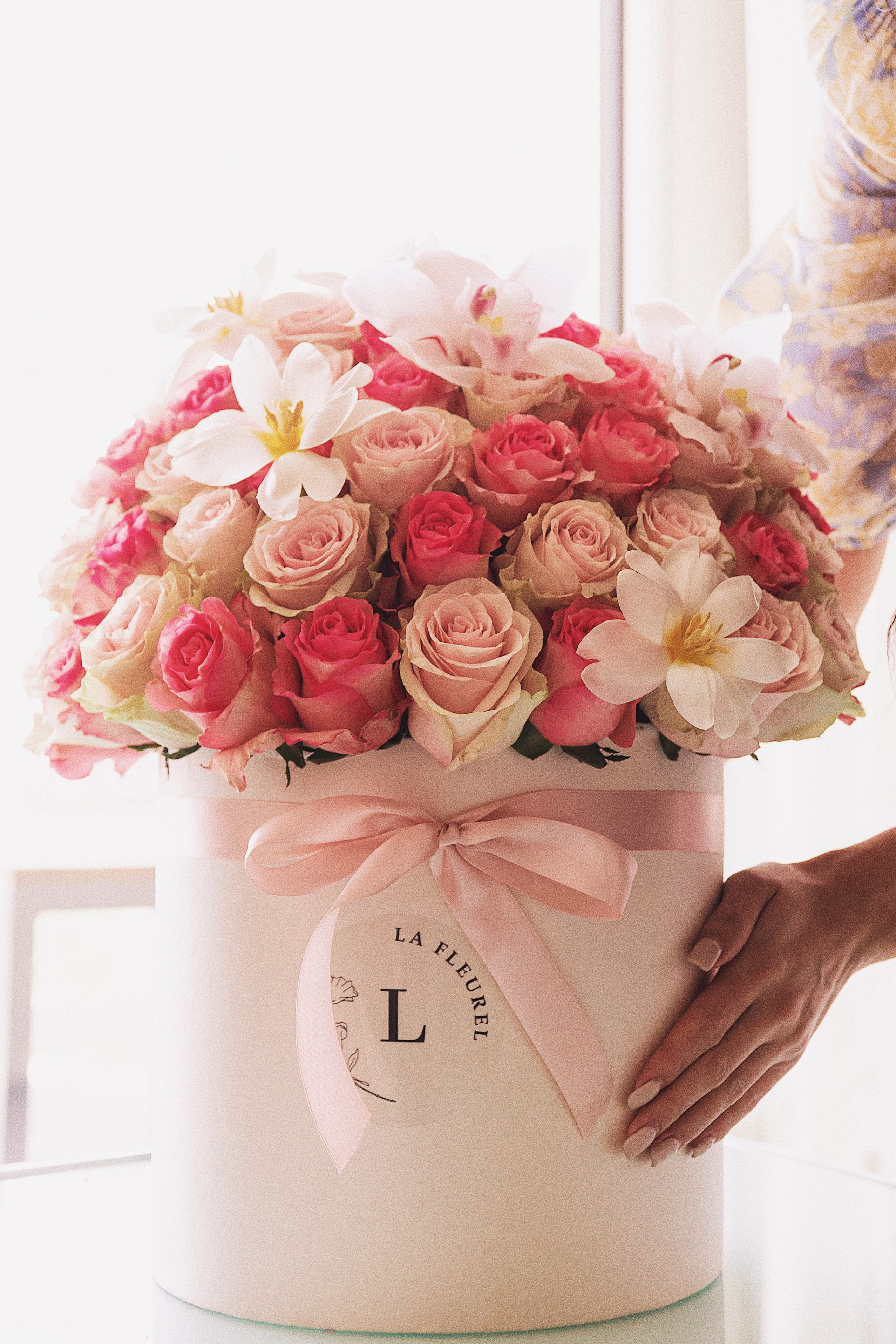 Everything pink  - This beautiful arrangement filled with the pink roses to deliver your special message to your special someone.  Perfect for any occasion. You can choose any color of the box.  Arrangement includes: roses and tulips Medium box  Custom greeting card 