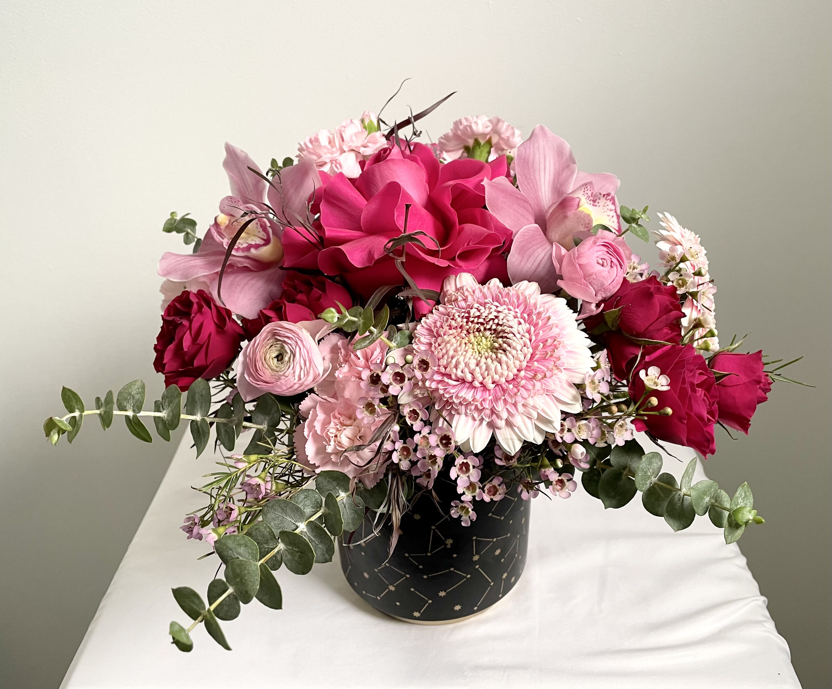 Barbie  - I'm a Barbie Girl in a Barbie world! Barbie is a whimsical arrangement of pink flowers arranged in a glass vase with a ti leaf wrap. Perfect for any pink lover!   Delivery Info- We make all of our deliveries after 1pm every day. If the weather is very cold, we prefer not to leave the flowers outside. Please let the recipient know that they should expect delivery. 