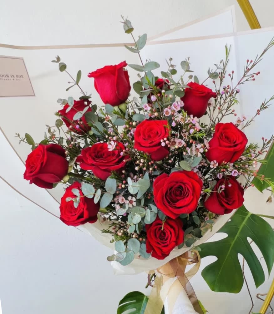 Rose Wrapped Bouquet (1dz) - *1DZ Rose (w/Seasonal filler flowers + Greenery) Wrapped Bouquet  *Store Hours: Mon~ Fri: 10:00 a.m. to 6:00 p.m. Sat: 9:00 a.m. to 4:00 p.m. Sun: Closed  *Delivery:  Deliveries occur roughly between 9am - 5pm. We are unable to offer further specific delivery windows or guarantee delivery times. but we will always do our best to accommodate requests. If your delivery address has a gate code number, please provide it for smooth delivery.  *PICK UP:  Please try to time your pickup as close to the shop as possible to avoid congestion and ensure the freshness of your flowers. Thank you!   *Please note that your arrangement may vary slightly from the picture depending on the season and store stock, but we will match color schemes and guarantee it will be fresh &amp; beautiful.  Thank you!