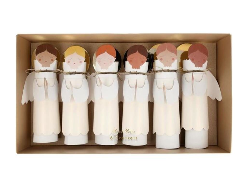 Angel Crackers - These beautifully designed angel crackers will look absolutely charming on the festive table. Crafted from iridescent card, with gold foil halo details and glittery gold thread, they're almost too glorious to open! Each contains 1 small gift, 1 hat &amp; 1 jokeIridescent glitter &amp; gold foil detailPack of 6Pack dimensions: 15 x 8.5 x 2.75 inches. Meri Meri has been using imagination for over 30 years, from founder Meredithe creating their first hand-made cards on her kitchen table to their present studio of designers, illustrators and crafters conjuring up party products, decorations, children’s toys and stationery. Everything they produce undergoes an imaginative evolution, starting with that spark of a new idea through to the careful choice of a finish to make a product perfect.