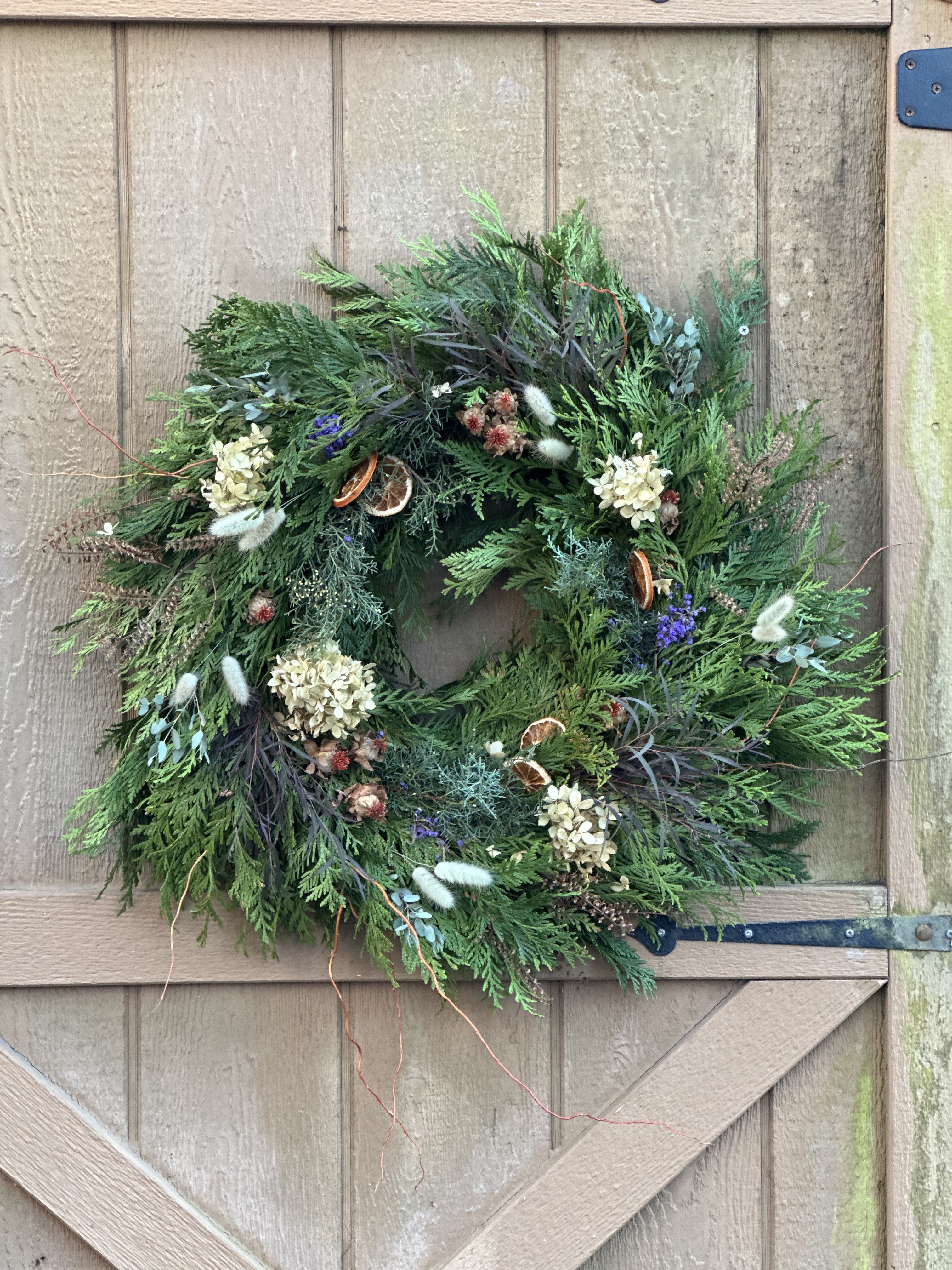 Naturally Lovely Wreath - roughly 24&quot; diameter wreath of fresh greens harvested from the farm, adorned with natural elements dried throughout the year....  makes for a sensational statement!