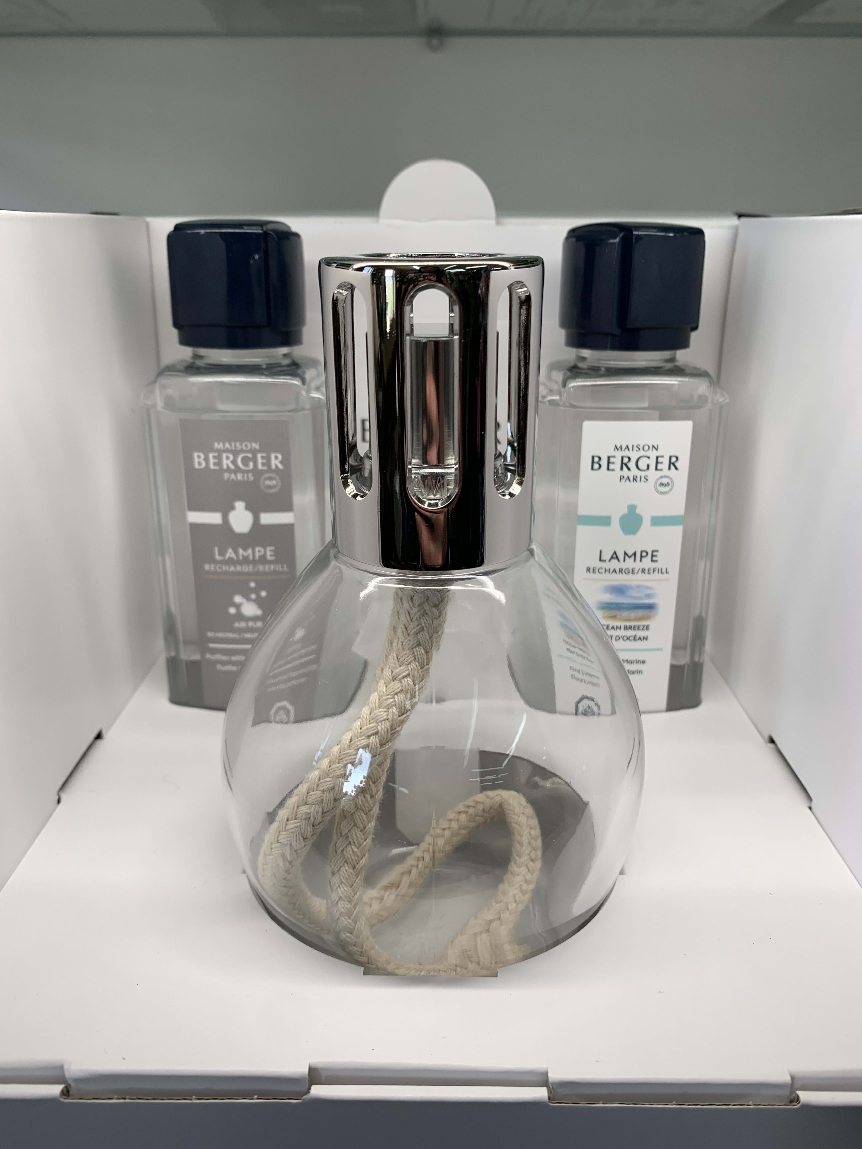 Lampe Berger Gift Set - In the beginning, the Lampe Berger was only intended to clean the air of hospitals and eliminate germs. Over the years, the perfume dimension has been added to this use. The diffused odor became more pleasant allowing the catalytic lamp to become more popular amongst households. This gift set is a great gift for any occasion!