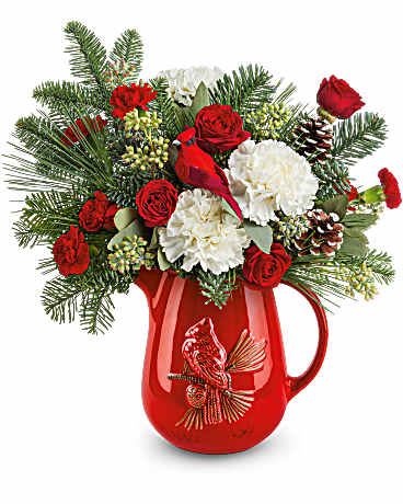 TELEFLORAS SCARLET CARDINAL BOUQUET  - RED SPRAY ROSES, WHITE CARNATIONS, RED MINI CARNATIONS, SEEDED EUCALYPTUS, NOBLE FIR, WHITE PINE, AND PINE CONES,  IN A CARDINAL CERAMIC PITCHER
