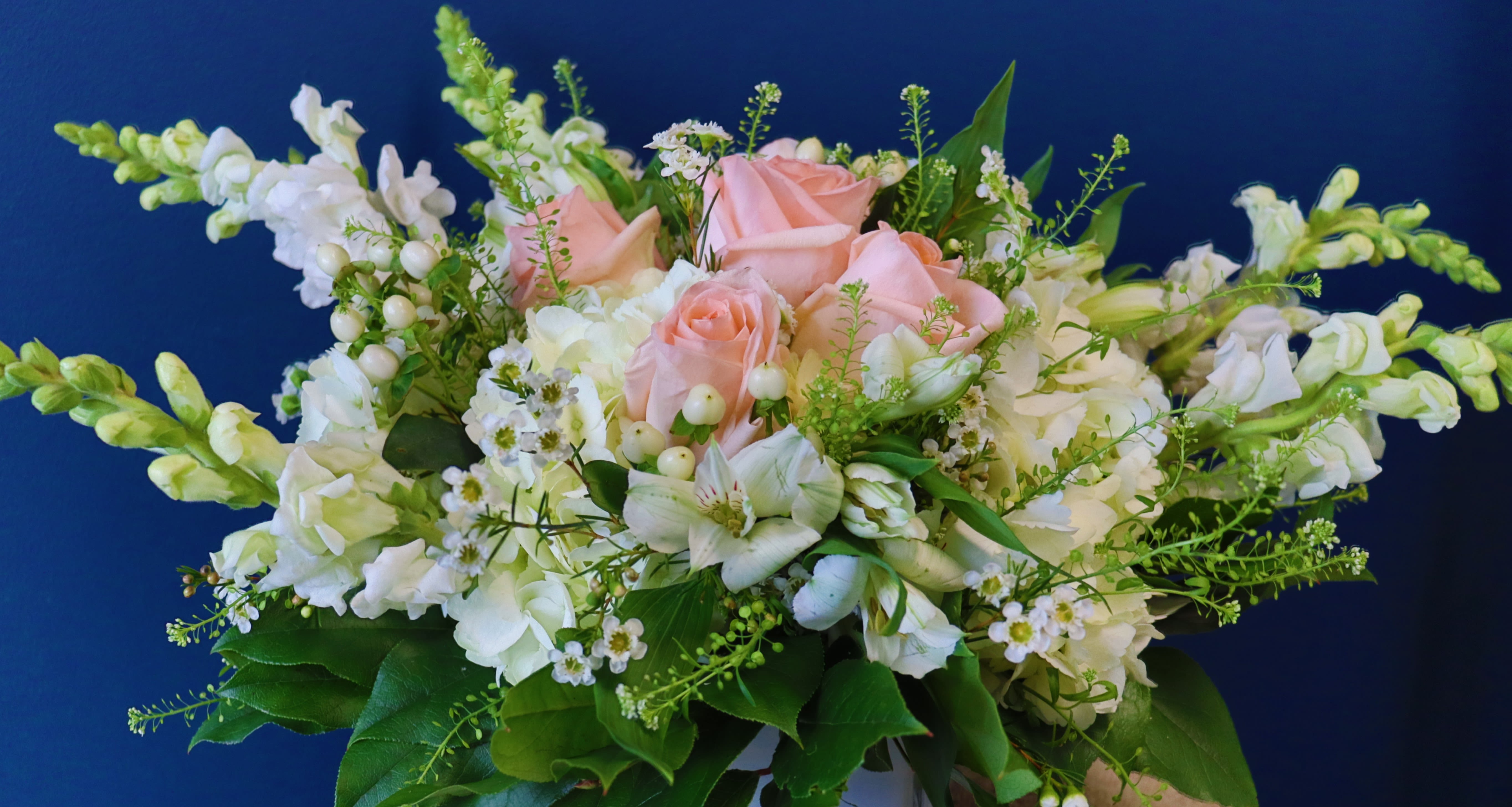Chardonnay - Inspired by the elegance of Chardonnay, this arrangement pairs roses, snapdragons, and hydrangea for a sophisticated floral experience. Ideal for Mother’s Day or any celebration, it’s a toast to beauty and grace.