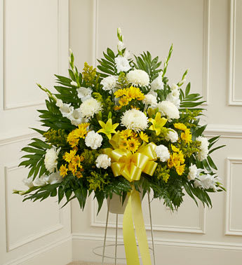 Yellow &amp; White Heartfelt Funeral Basket - It is customary to honor a life well lived with a final tribute that not only commemorates that life, but offers a message of hope and love to the family and friends left behind. This standing sympathy basket, crafted by our expert florists, is filled with yellow and white blooms, creating a touching and heartfelt memorial.