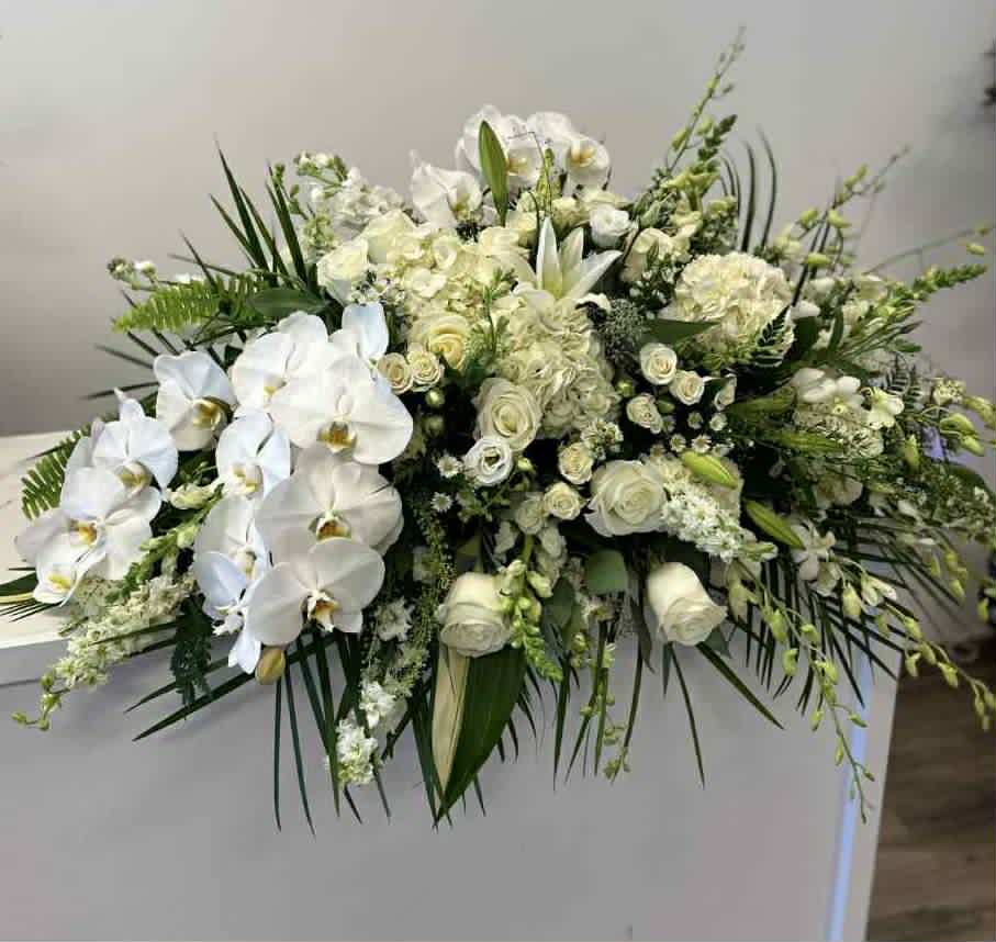 Elegant Casket Spray - All White casket spray with Orchids   Standard 2 Orchids and dendrobium Deluxe 3 orchids Premium 5 Orchids