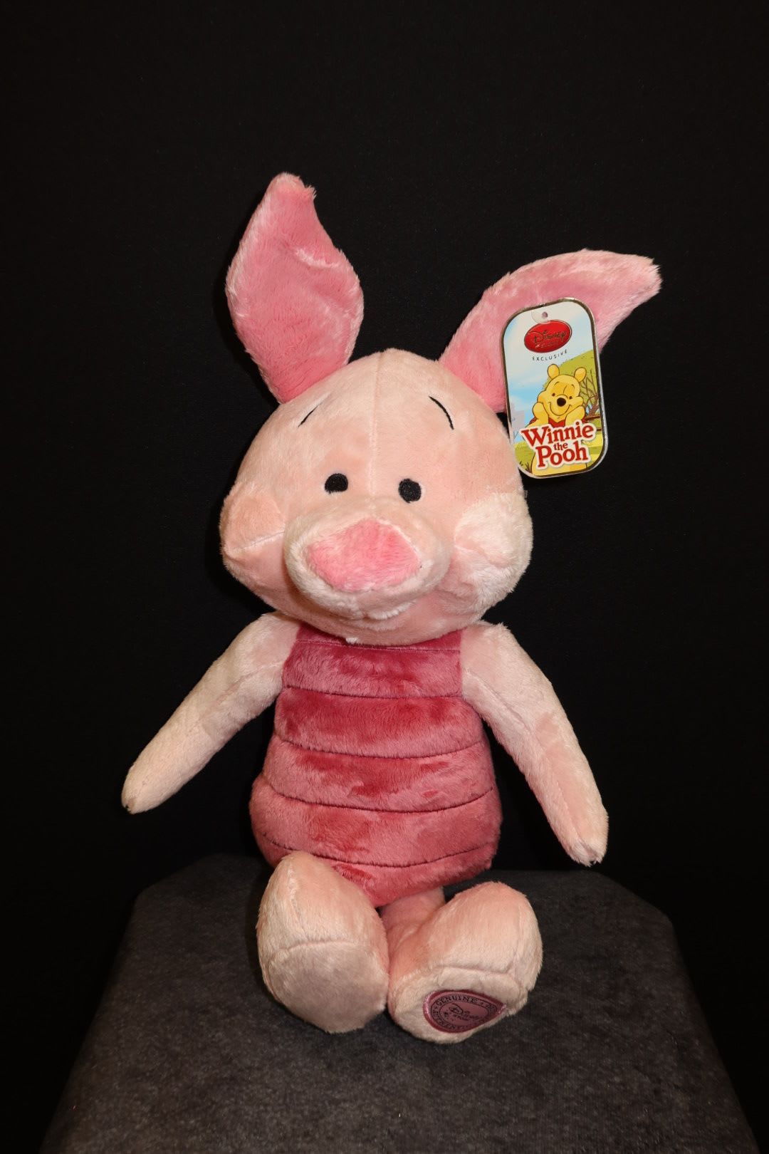Pink Piglet Plush Disnay edition - A sweet pink plush with soft fabric and adorable details. Great for surprising someone or adding to a bouquet delivery.  Soft plush  Medium size  Cute pastel colors 