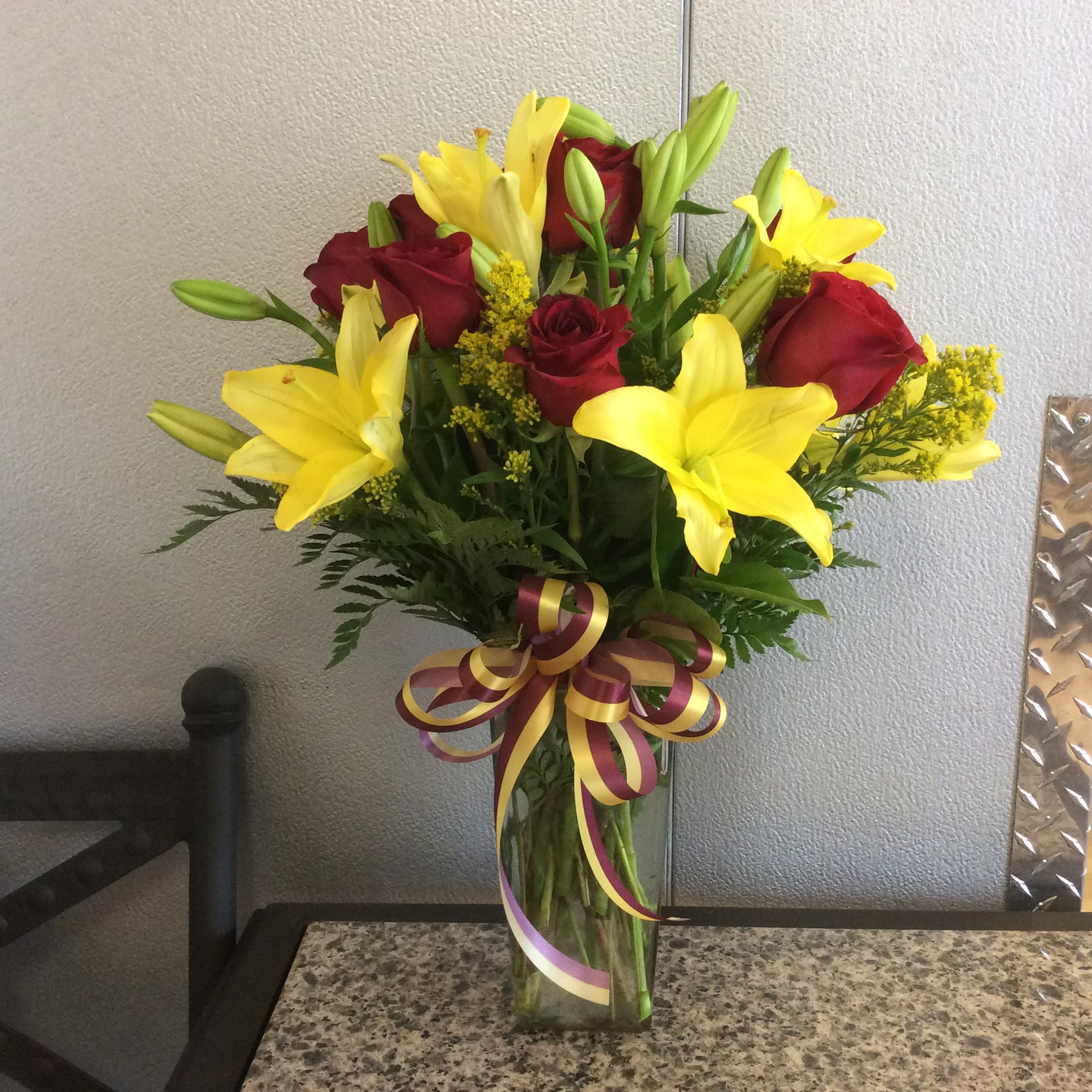 ASU Lily Rose Mix - Lilies &amp; roses arranged in glass vase w/ Maroon &amp; Gold striped ribbon - Approx. Height 18&quot;