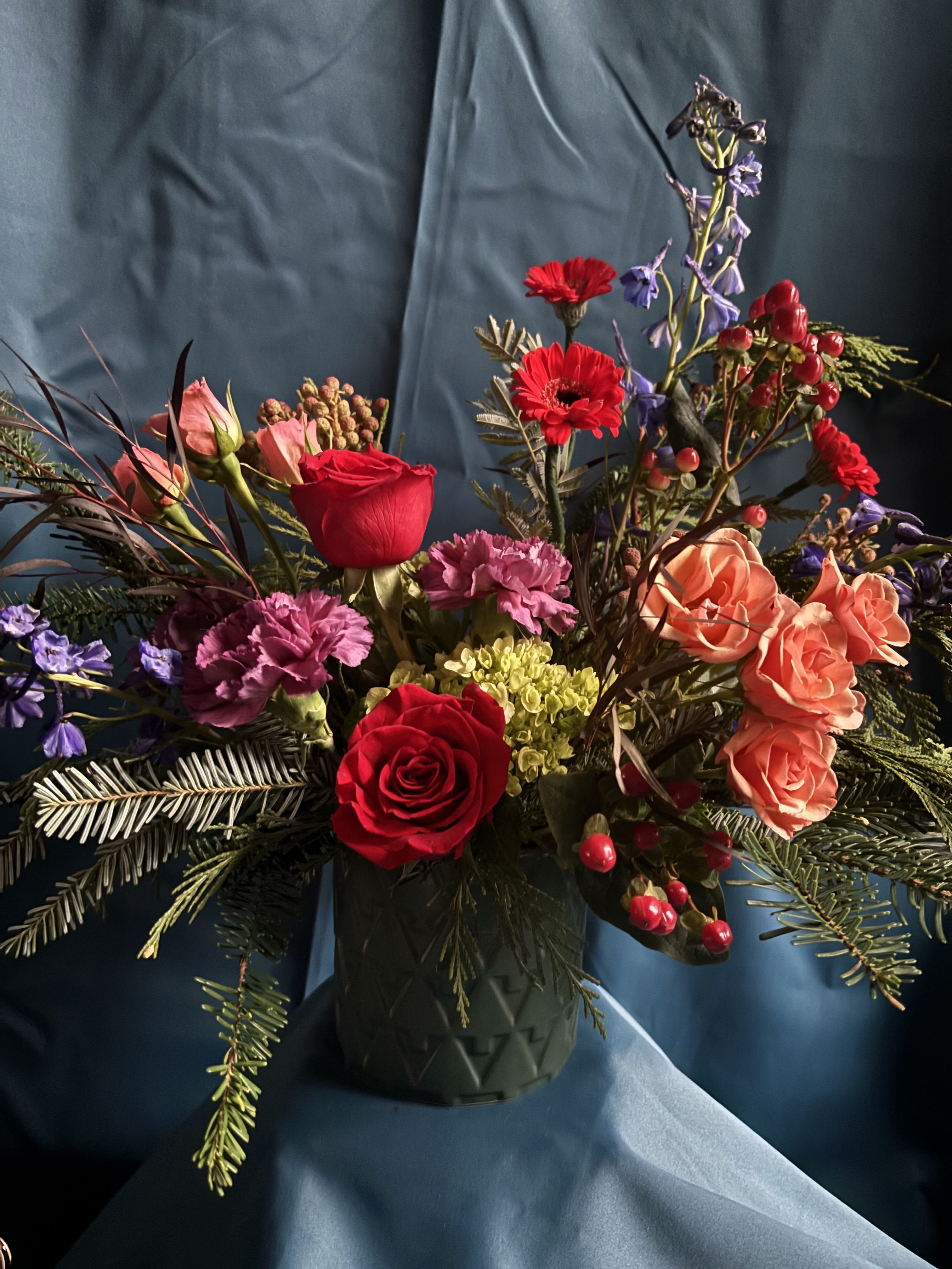 Designer’s Choice, NOVELTY VASED ARRANGEMENT - The cutest little novelty vase of the season! Choose between ivory, green or orange, WHILE SUPPLIES LAST. Our designers will choose a complimentary color palette to warm the recipient’s heart. Feel free to offer any color or flower preferences. We will do our best to incorporate! 