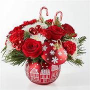 Cheer in the air  - Festive holiday blooms in a keepsake holiday ornament 