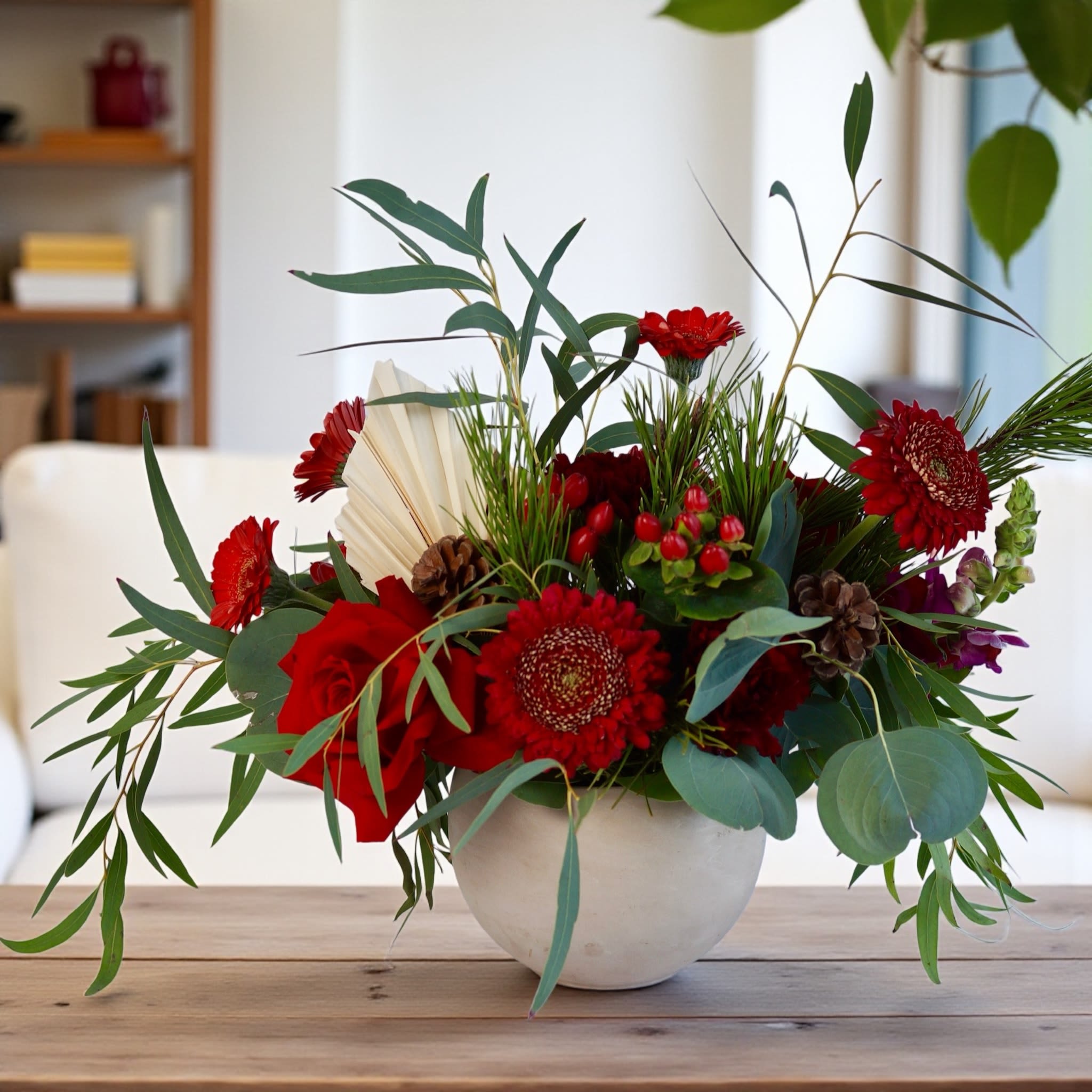 Cozy Christmas  - Mix of Red flowers add Christmas Greenery, so cozy all you need is a cup of cocoa!
