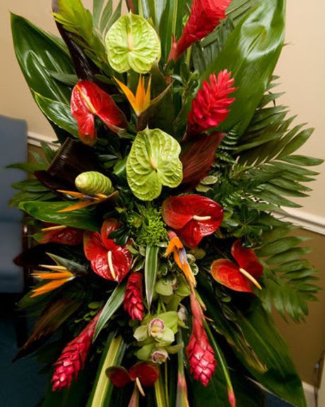 paradise spray - With birds of paradise, fresh ginger, red and green antherium, a touch of delicate orchids and tropical greens, this spray is artistically designed to represent your condolences.