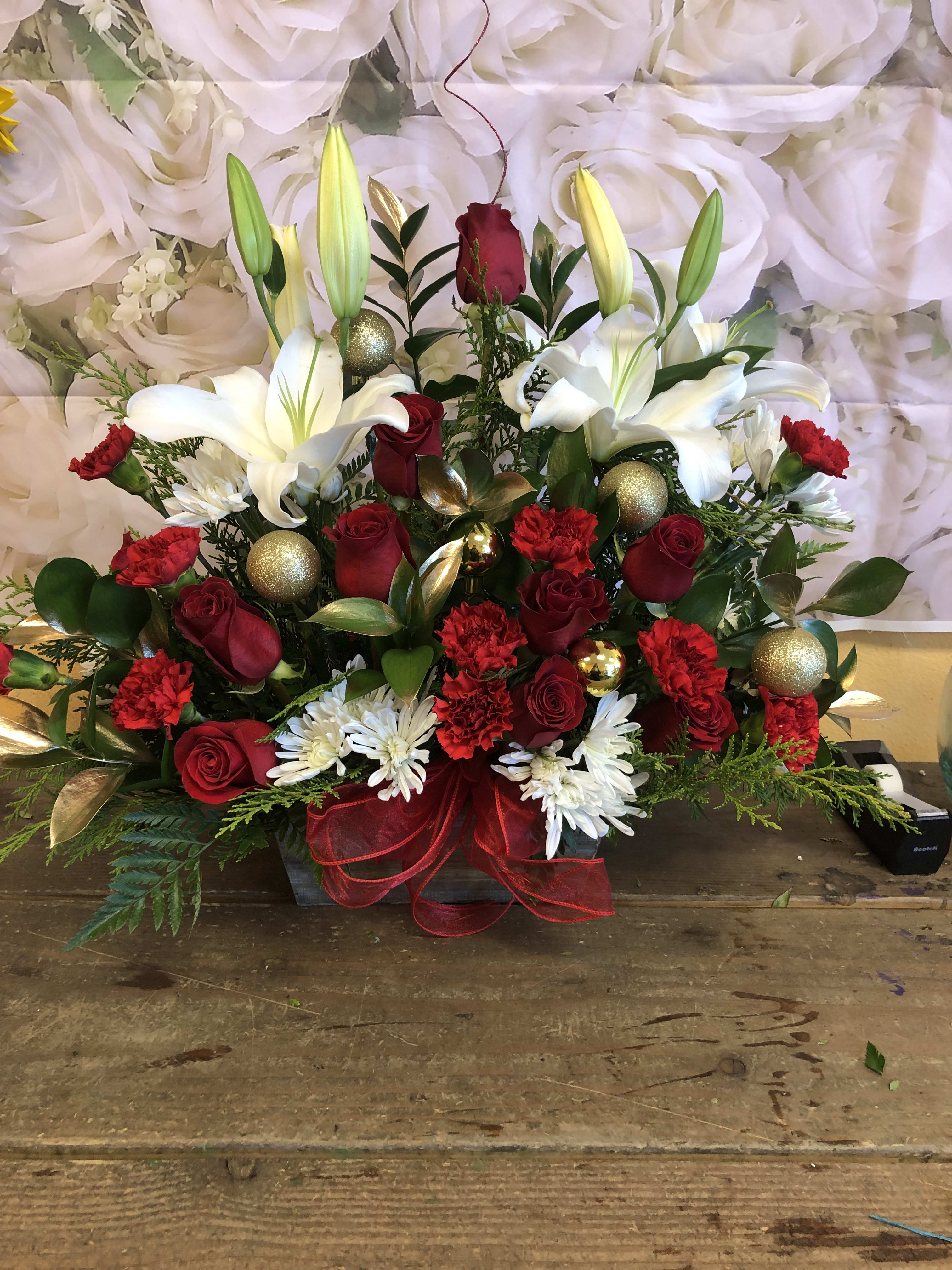 Christmas Box (Designer choice)  - A wood box with Christmas greens, Roses, Carnations, Alstroemeria, Cushion and Christmas Ornaments. 