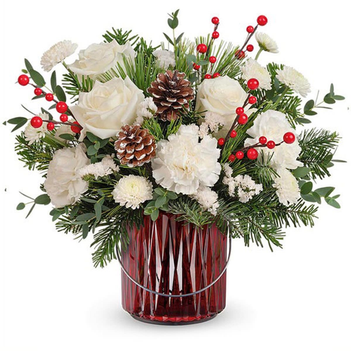 Teleflora's Gleaming Holiday Bouquet - This Christmas bouquet carries your best wishes for a joyful holiday season with vibrant crimson blooms and fresh forest greens. The red lantern vase also serves as a delightful candleholder! This bouquet features white carnations, white button spray chrysanthemums, white statice sinuata, noble fir, parvifolia eucalyptus, and white pine, accented with cedar and greenery. It is elegantly presented in the Merry Glow Lantern, adding a festive touch to your holiday celebrations.  