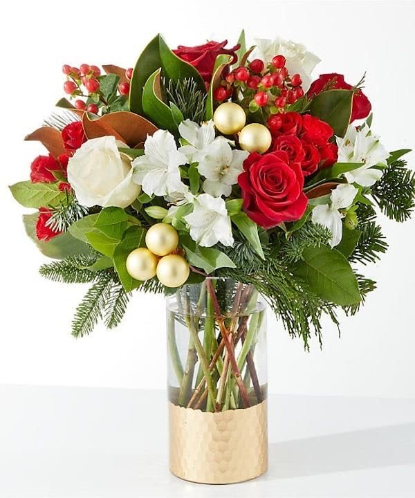 Joy &amp; Jolly Bouquet - Spread joy this holiday season with a shimmering arrangement of roses, alstroemeria, and the incredible scent of seasonal greens.