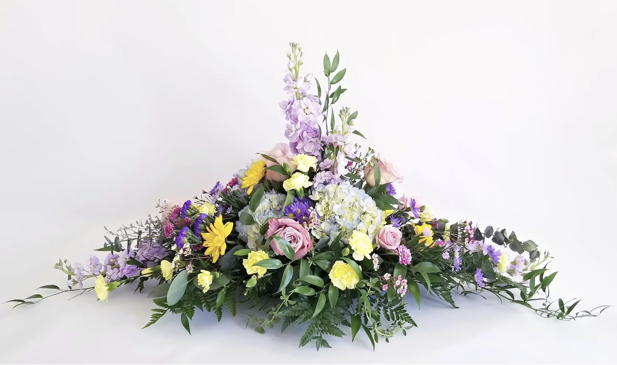 Pedestal Arrangement - Flowers and containers are subject to substitution and availability.