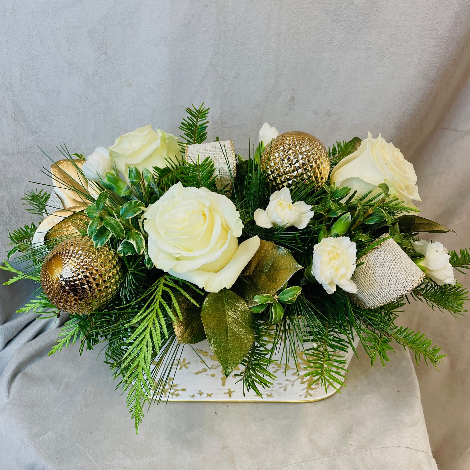 Deck the Halls - Deck the halls with this beautiful white and gold centerpiece.