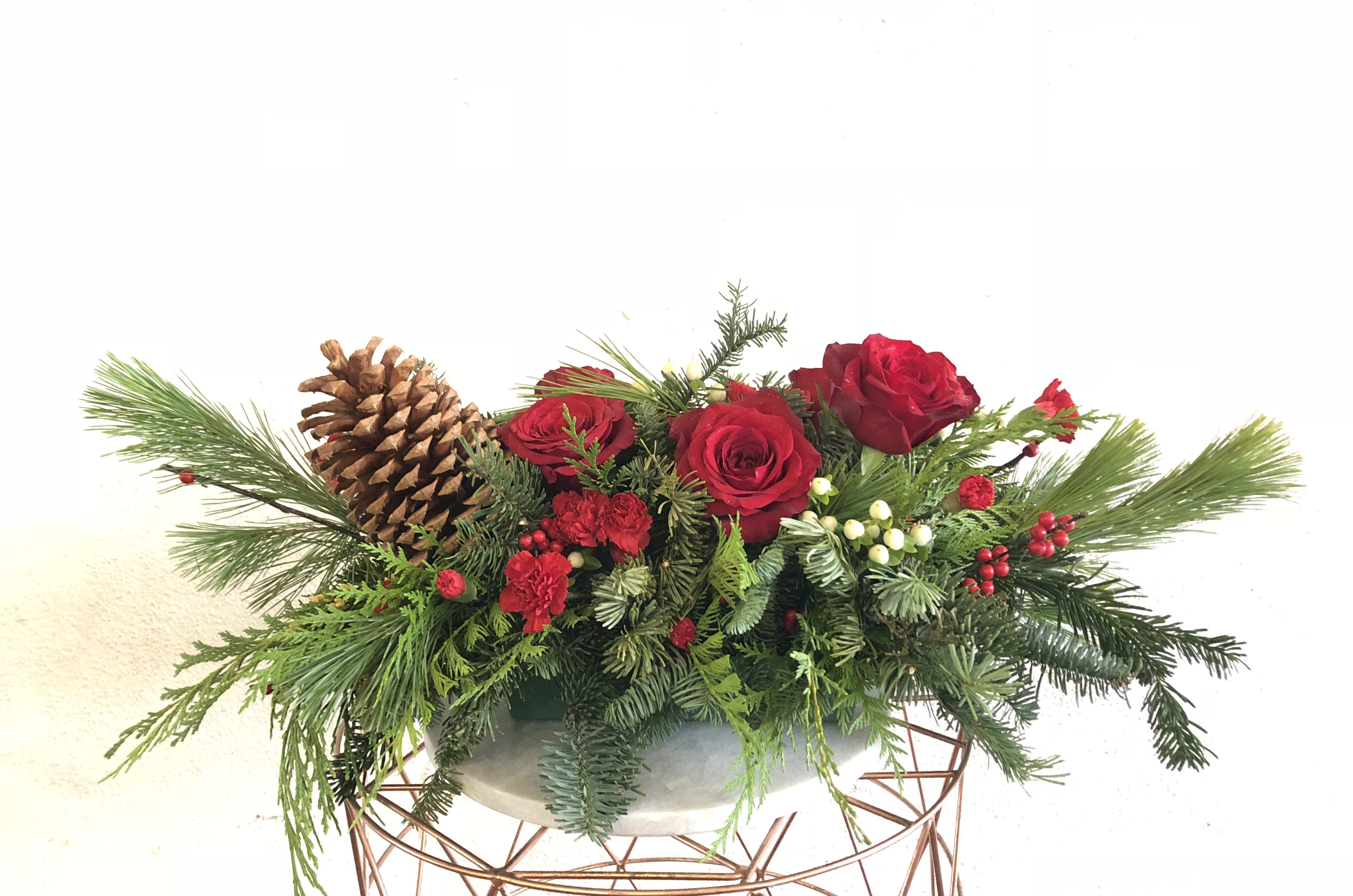 Christmas Classic - Your traditional centerpiece for the holidays with gorgeous reds and holiday foliage