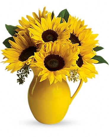 Sunny Day Pitcher of Sunflowers - Pour on the fun by sending this dazzling bouquet of summer's brightest blooms! Great if you're invited to a pool party, BBQ or just want to brighten up someone's day. Stunning sunflowers, salal and seeded eucalyptus are beautifully arranged in a brilliant yellow ceramic pitcher. This gift will be serving up fun and sun for years to come.