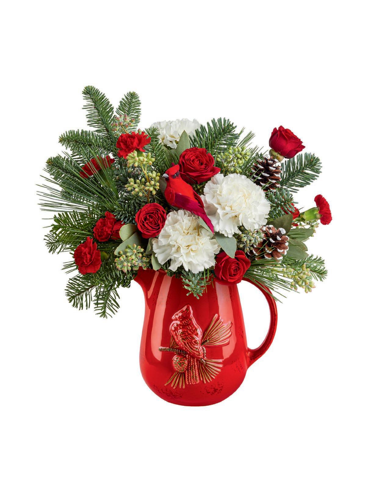 Festive Flight Bouquet  - spread holiday cheer with red blooms, winter greens and a charming keepsake cardinal pitcher