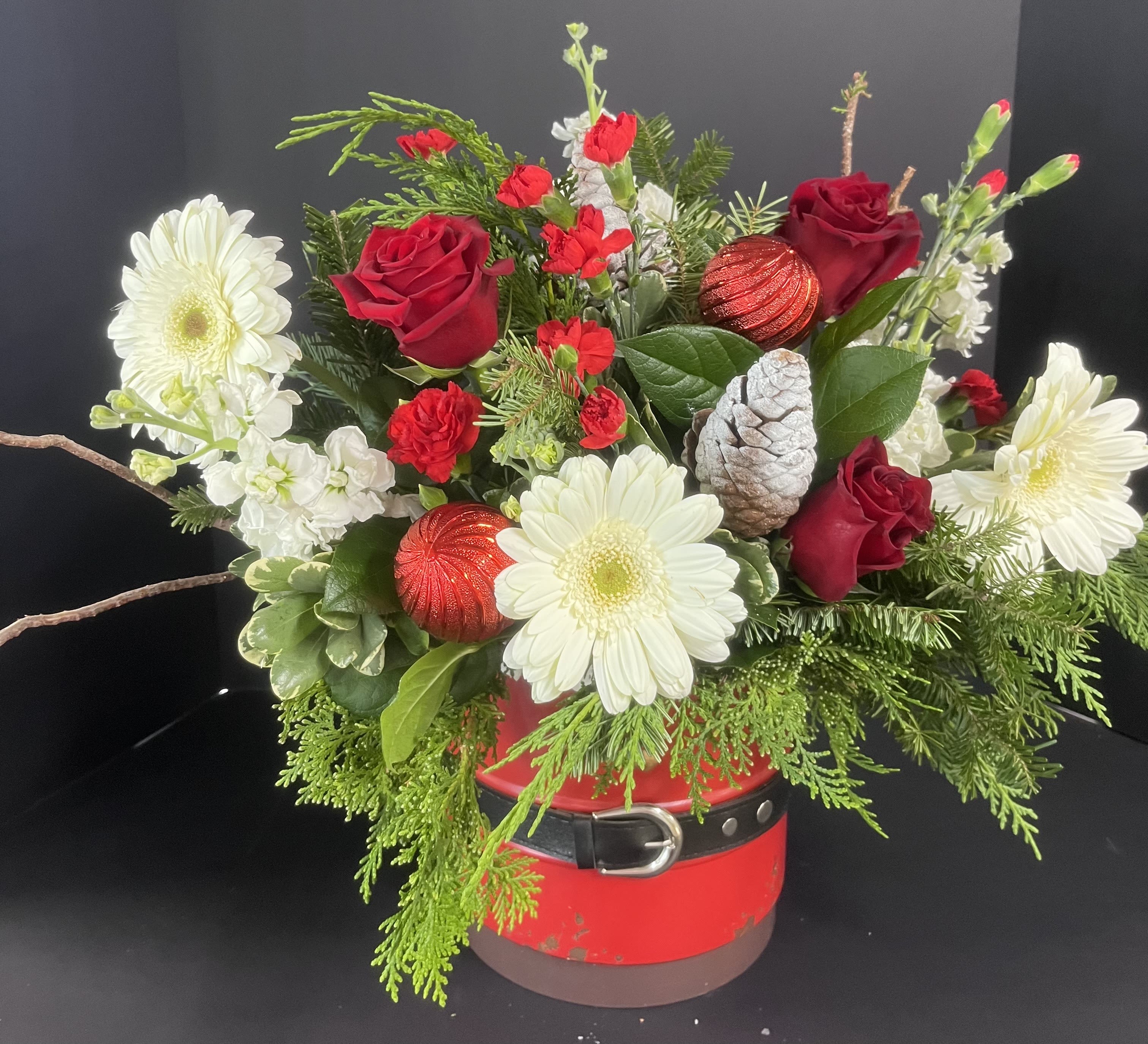 Ho,Ho,Ho Blooms - This bouquet is filled with bright, colorful blooms of the season. Send this fun arrangement to a friend for the holiday!
