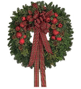 Fresh Wreath with Apples - Decorated with permanent apples and pomegranates, and tied with a festive bow, this wreath will be a warm welcome to all holiday guests.  One 30" wreath with oregonia, along with pinecones, apples and pomegranates, arrives tied with a plaid holiday ribbon.  Approximately 30" D  As Shown : TF91-1
