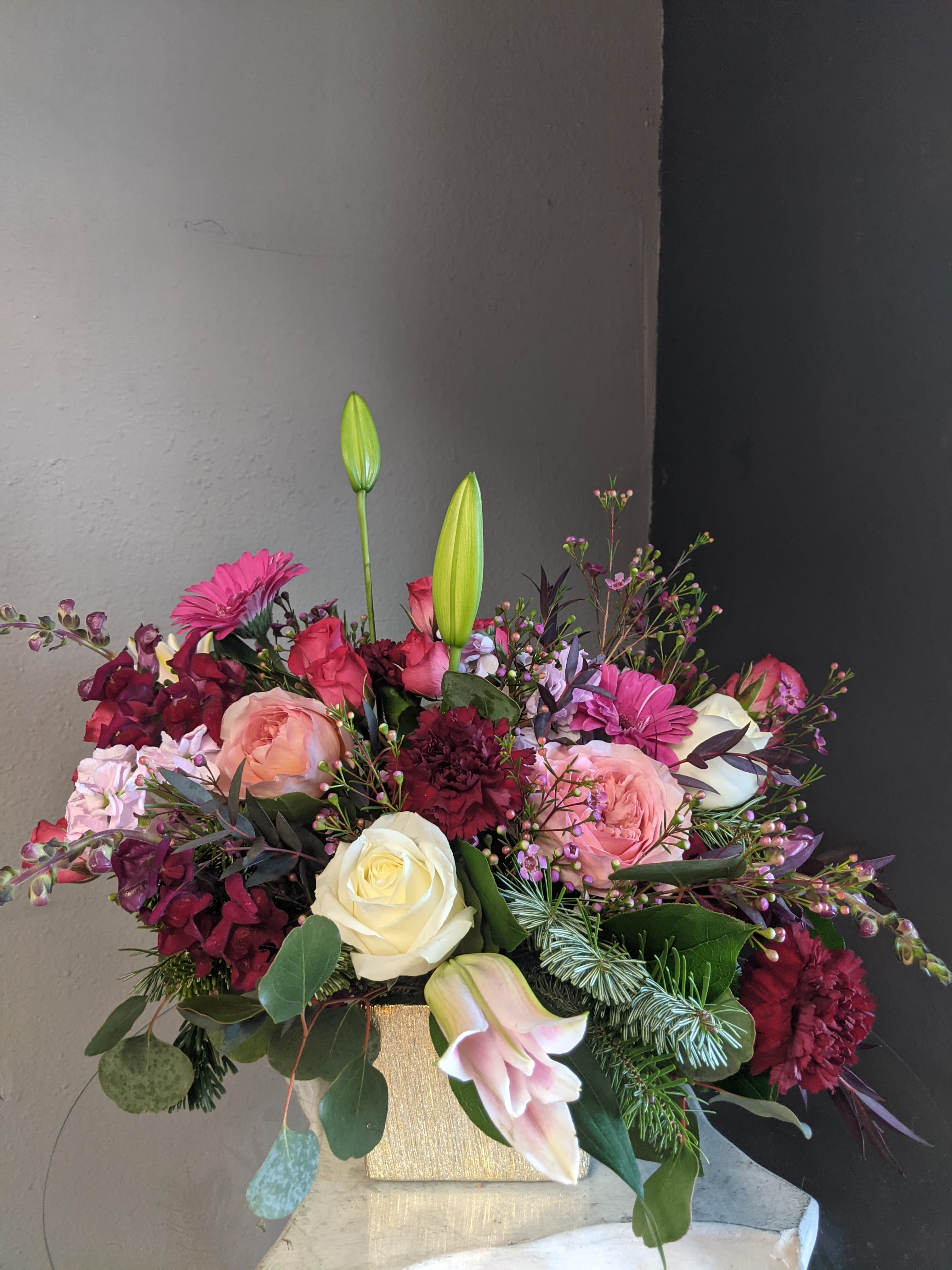 # 138 Winter Floral Arrangement  - A beautifully selected bunch of the freshest flowers in a vase uniquely arranged by hand.