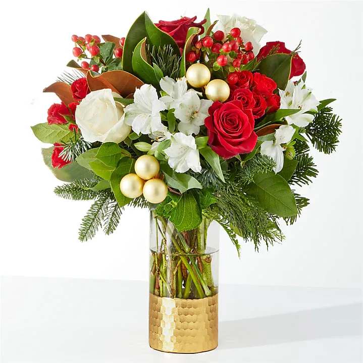 Joy and Jolly Bouquet - Spread joy this holiday season with a shimmering arrangement of roses, alstroemeria, and the incredible scent of seasonal greens.