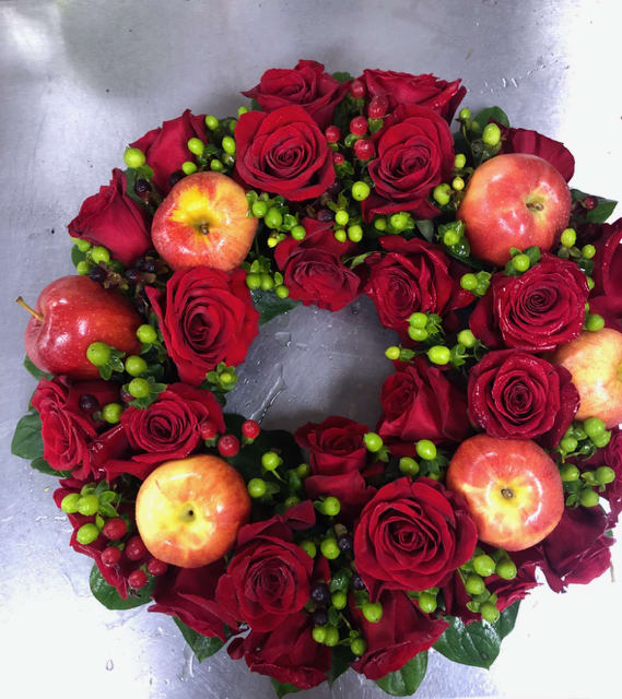 Apple Wreath with Red Roses - A wreath of roses, apples, and green berries