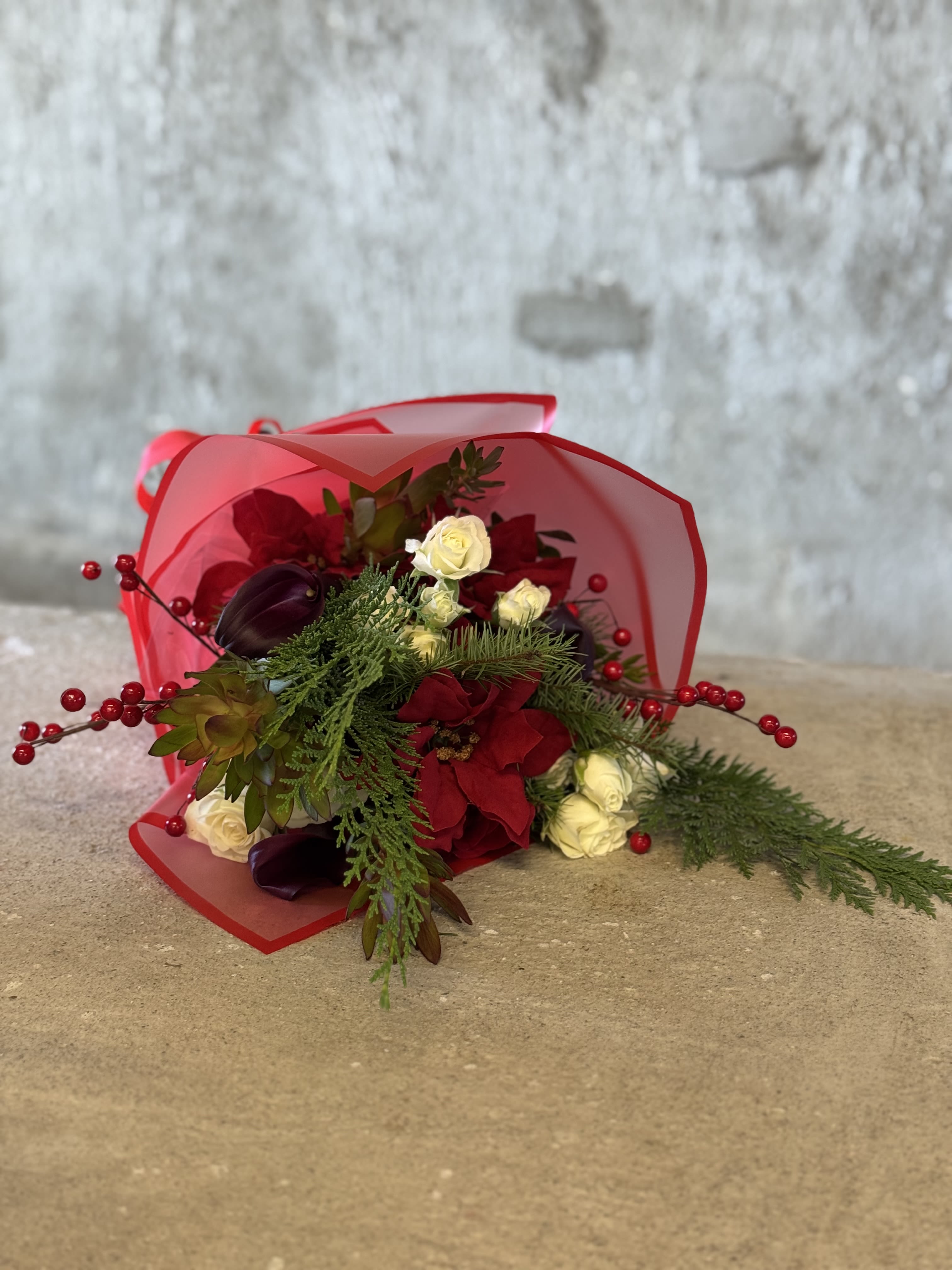 Seasonal Mixed Wrap - Mix of seasonal florals. Standard includes about 6-8 stems accentuated with foliage and textures.   Pictured [Deluxe]