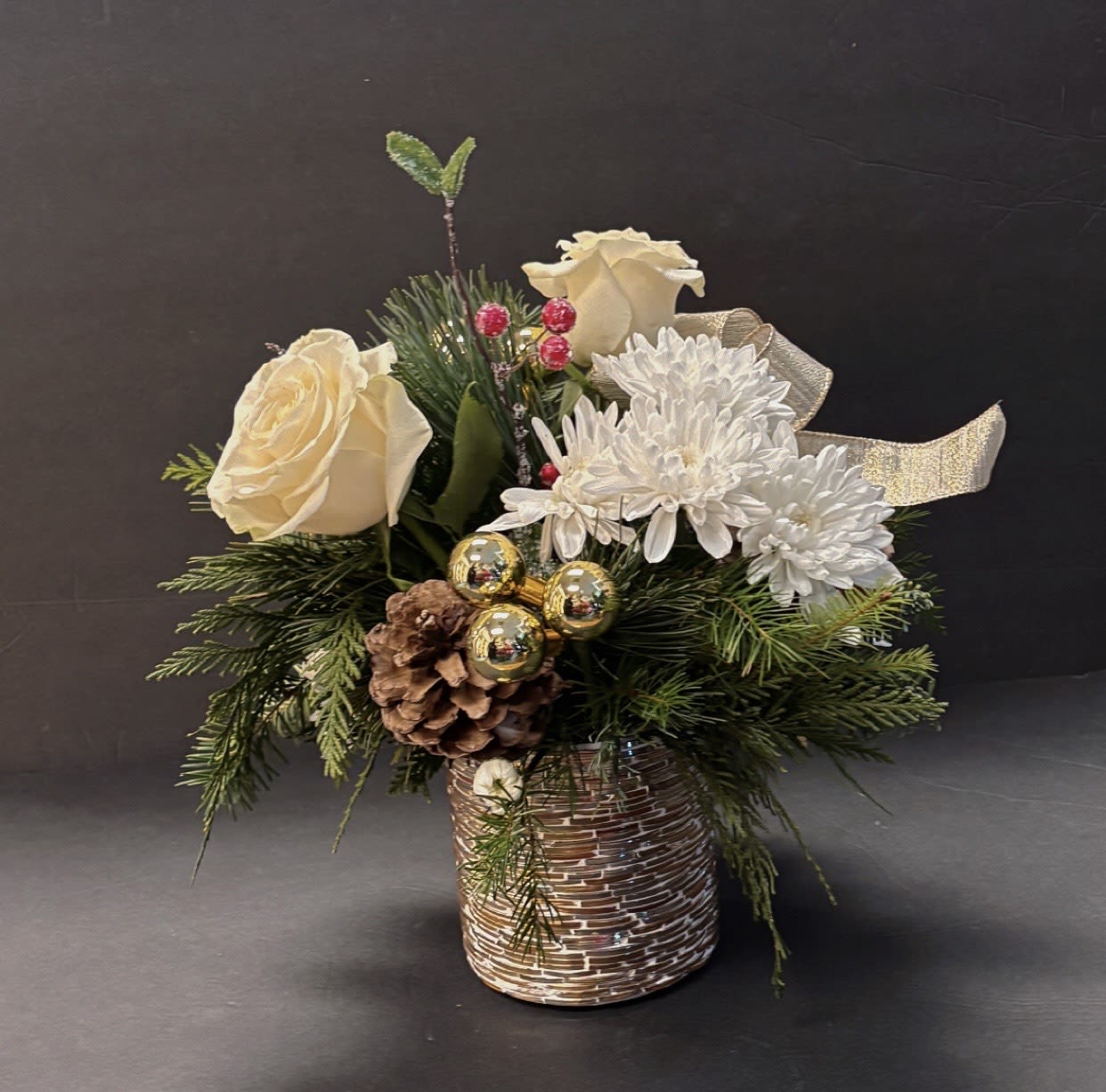 golden christmas - gold container filled with fragrant pine, white  seasonal flowers