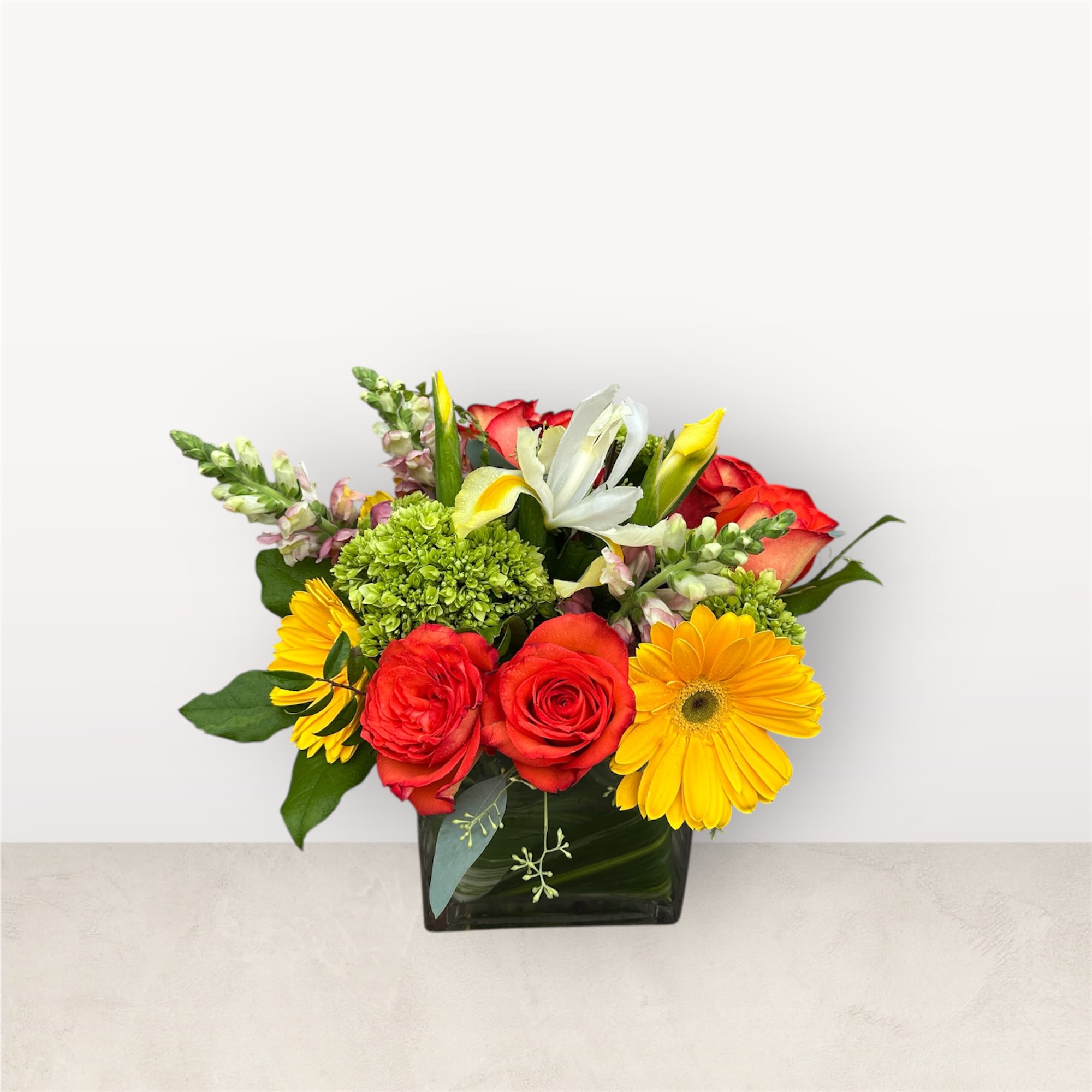 Citrine Charm - Citrine Charm. A radiant blend of golden blooms and fiery accents, designed to bring warmth, elegance, and sophistication to any occasion.