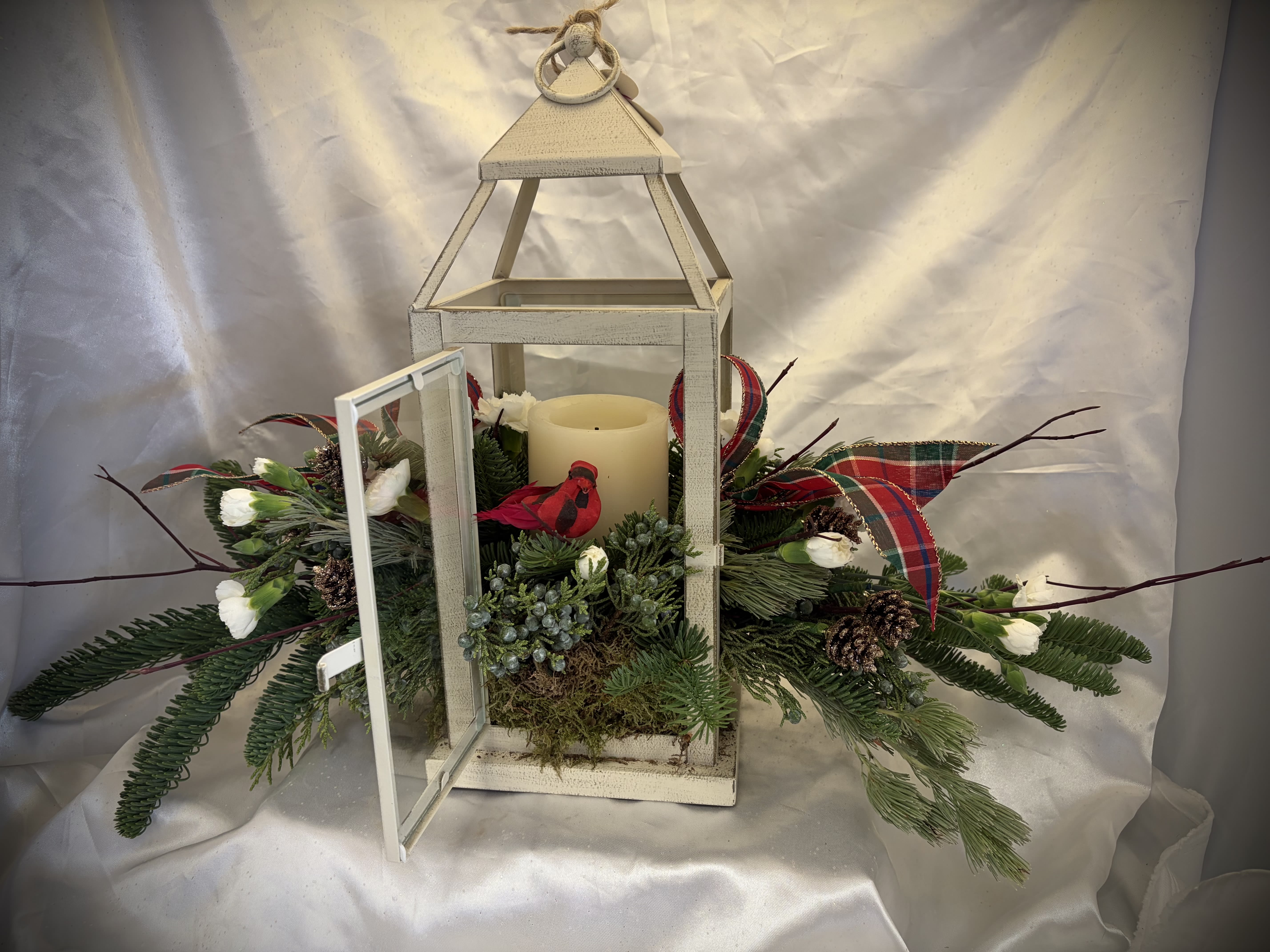Cardinal Holiday Lantern with Candle - Beautiful, rustic lantern with candle and festive greens adorned with a charming cardinal