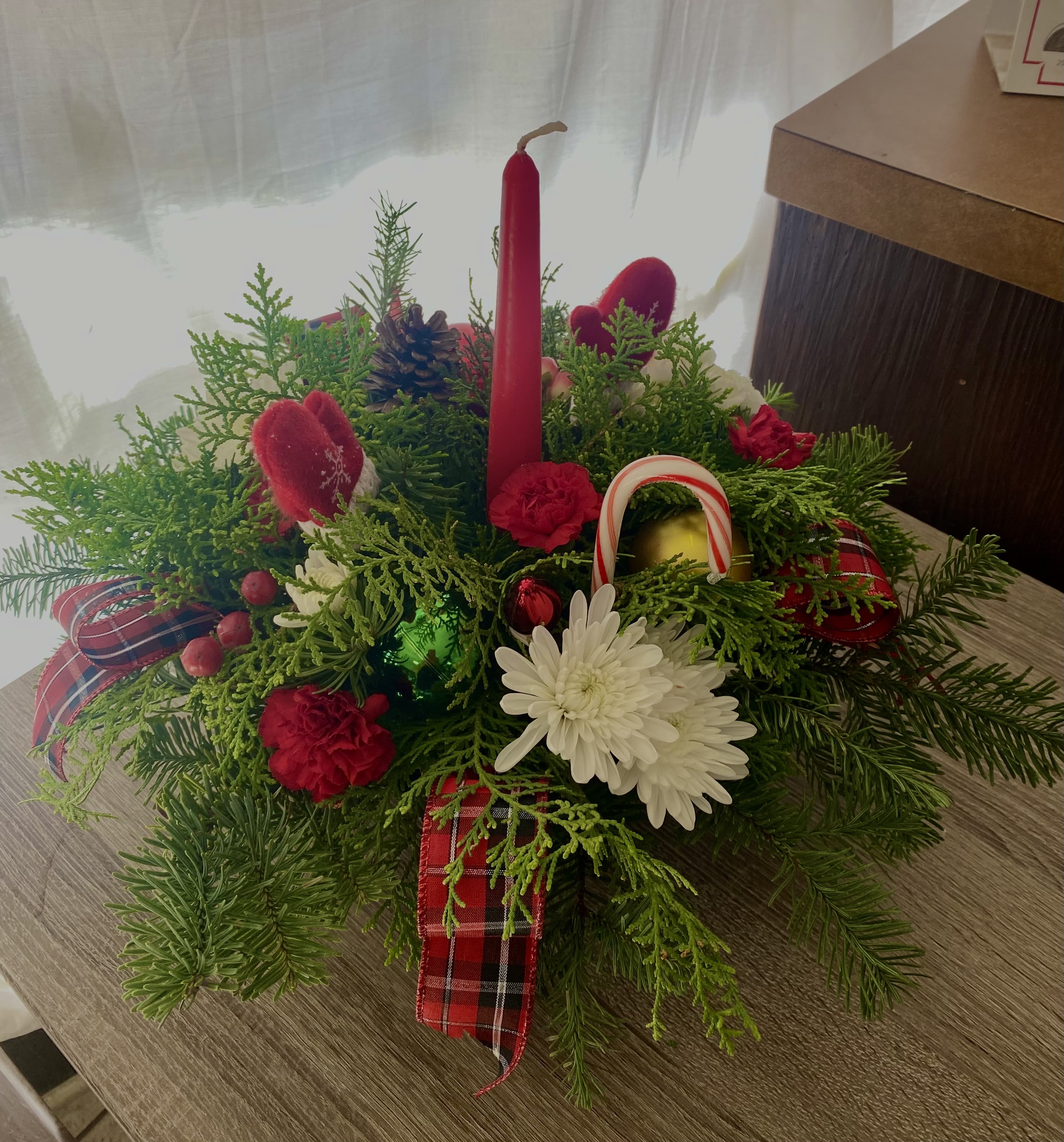 1- CANDLE CENTERPIECE.   - Tropical CHRISTMAS GREENS,    Touch of ROSES,   ORNAMENTS, PINE CONES ,CANDY  Candle May be omitted …..