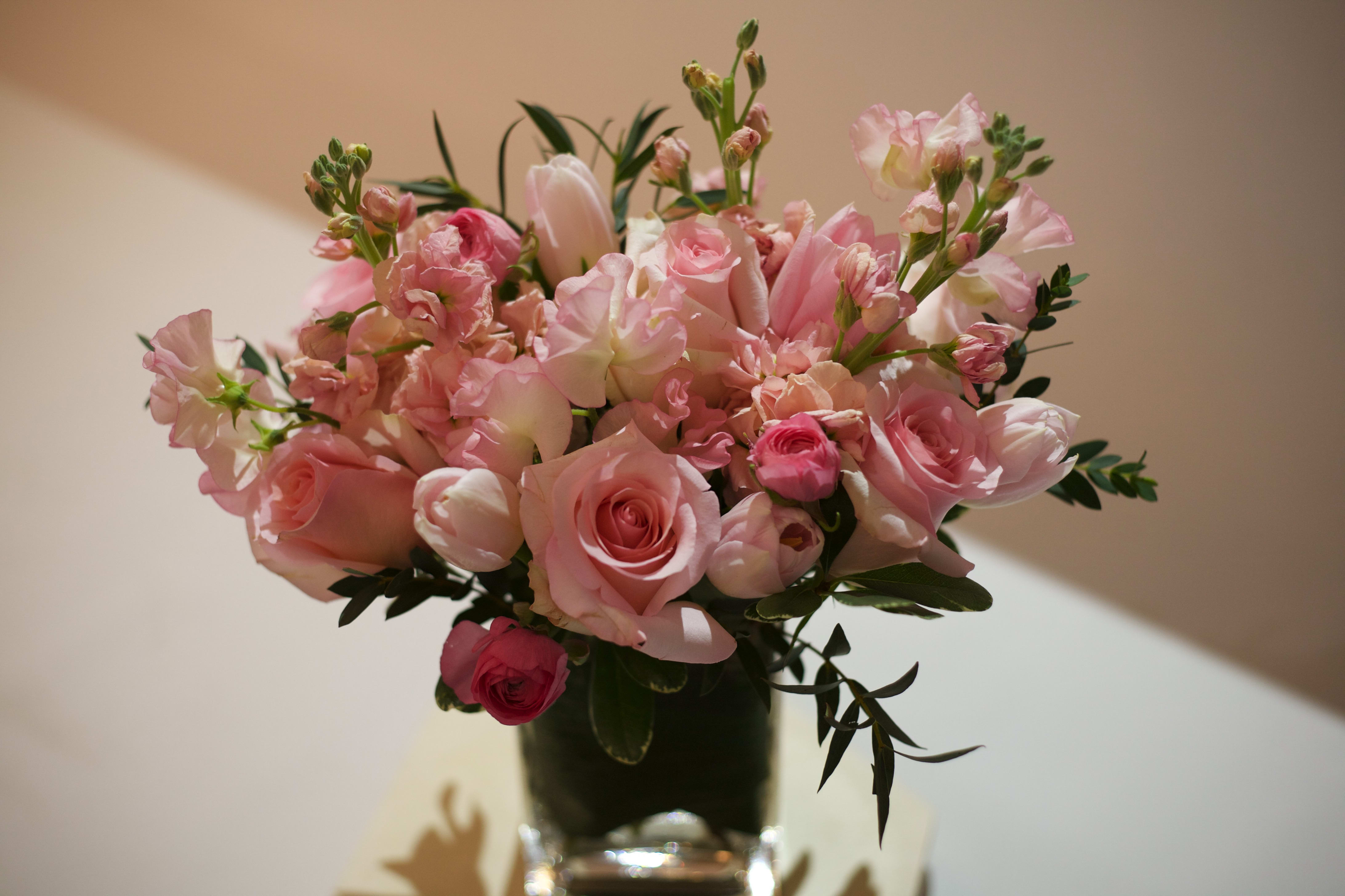 Textured Pinks - Who can resist the rich layering effects of light pink sweet pea on fluffy pink roses, delicate blush tulips, and rich pink ranunculus?! This arrangement is sophisticated take on traditional pink to express the sweetest of romantic sentiments.