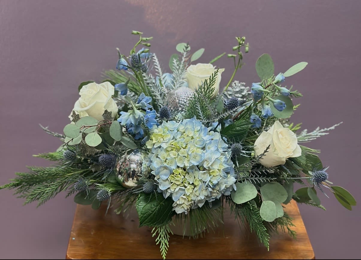 Winter Wonderland  - Blue delphinium, hydrangeas, roses, thistle , and greens  