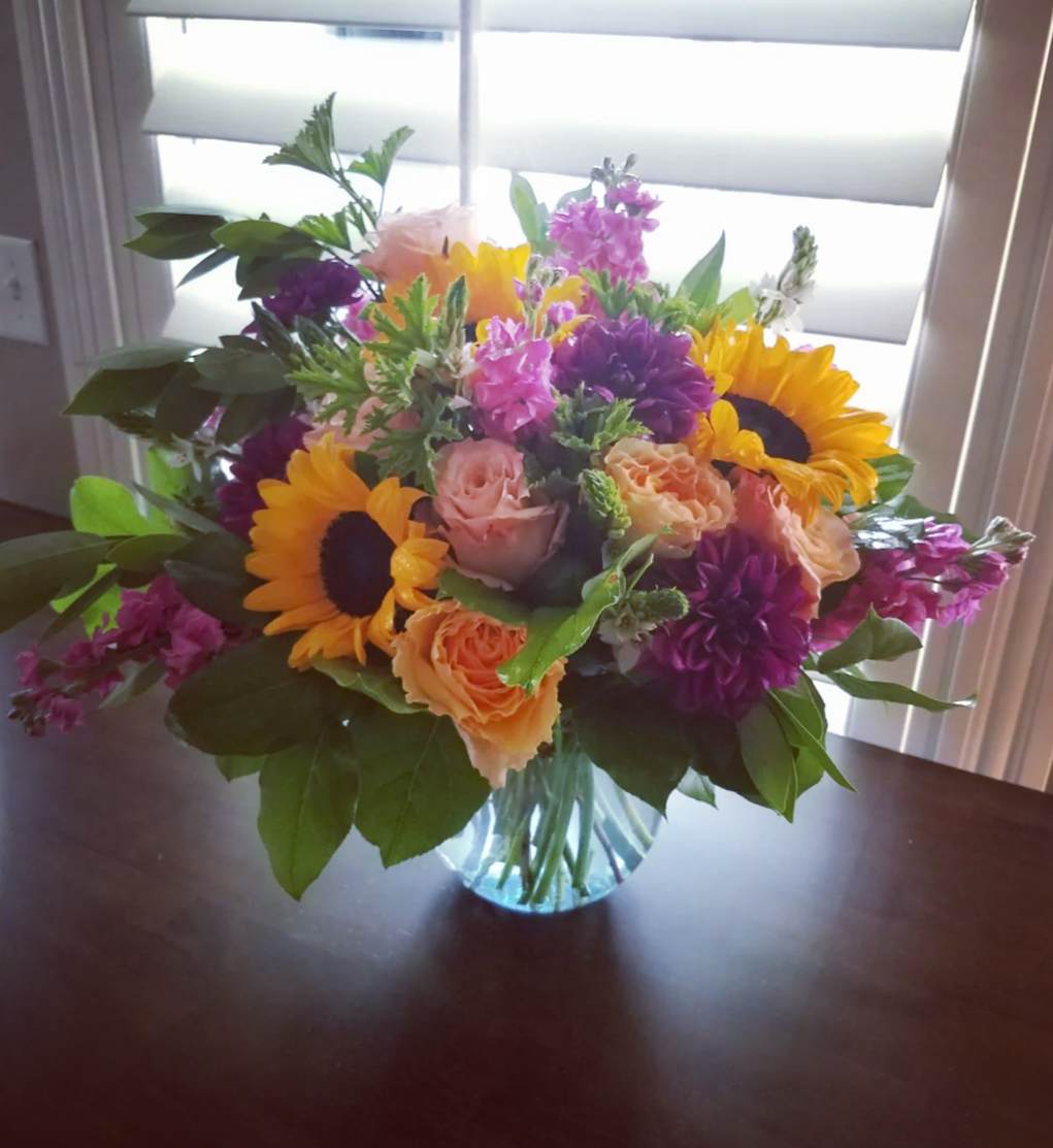 Fantastically Fragrant - We need a scratch and sniff option for this beauty! A gorgeous arrangement full of fun color and seasonal fragrant herbs make up this arrangement that excites all of the senses!
