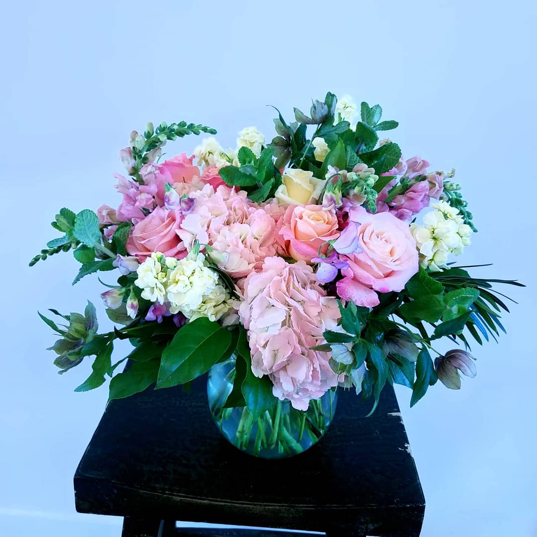 Spring bloomers - This large and lush display of spring blooms is perfect for the woman in your life.