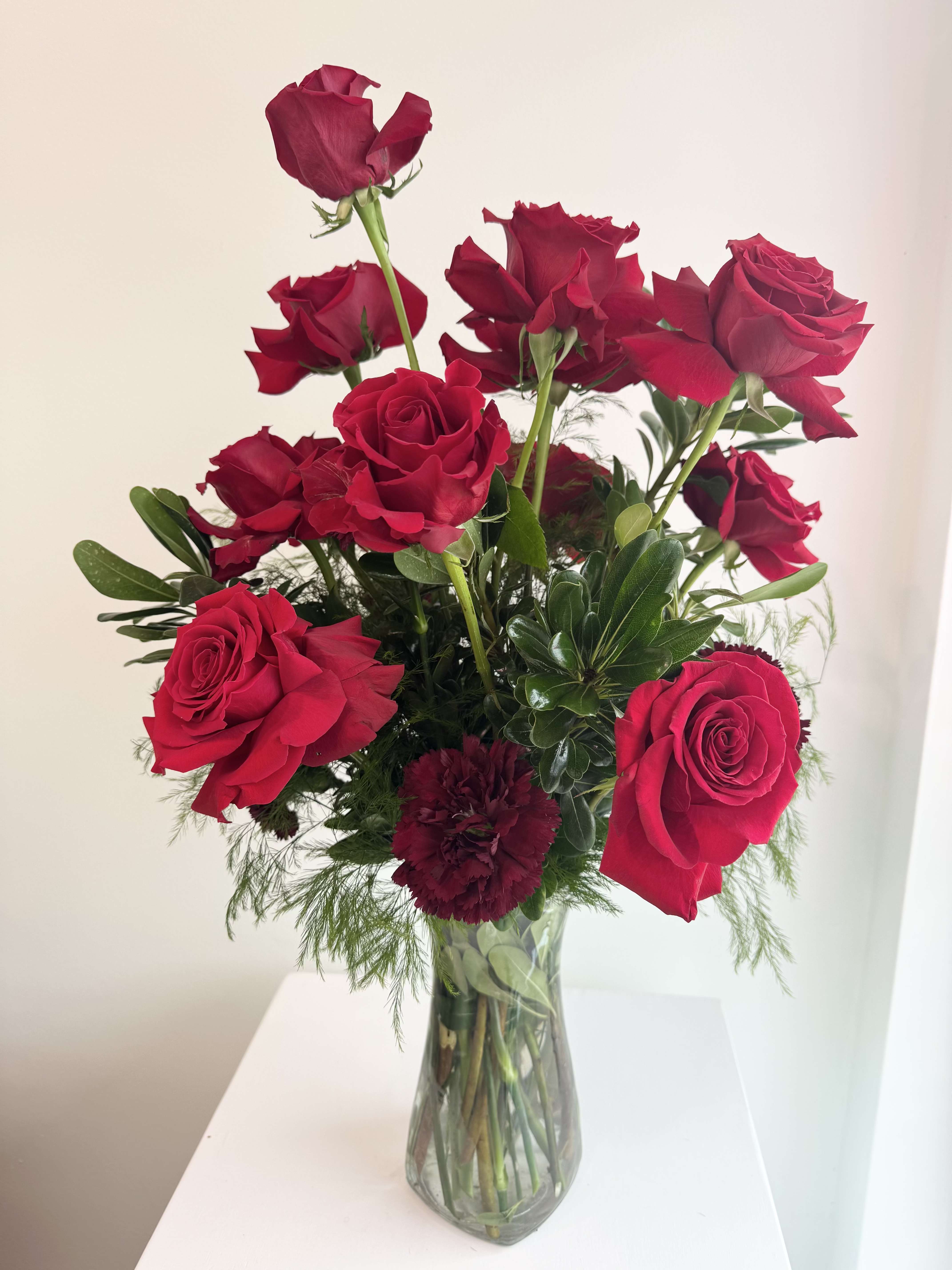 "SEXY RED DOZEN" ROSES - A modern, sexy dozen roses arrangement, the perfect way to show your love and make someone feel truly special.