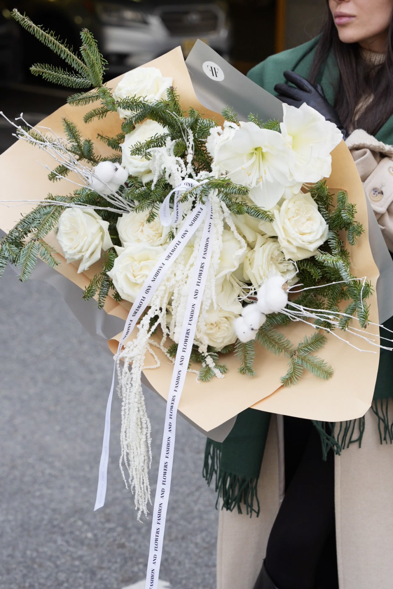 Frost &amp; Flowers - A luxurious winter-inspired bouquet featuring premium white amaryllis, garden roses, cotton, and fresh evergreen branches. Designed in our signature Fashion &amp; Flowers style, this arrangement blends modern minimalism with seasonal elegance. Perfect for winter celebrations, holiday gifting, or creating a sophisticated, cozy atmosphere at home. Same-day delivery available in New York and New Jersey.  A complimentary vase is included with every arrangement. 