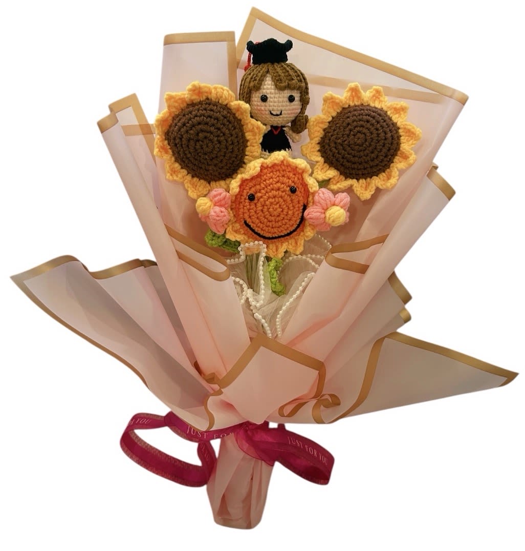 Handmade Crochet Sunflower Bouquet with Cute Doll - Bright, cheerful, and made to last forever  This handmade crochet sunflower bouquet features an adorable crochet doll, carefully crafted and beautifully wrapped for gifting.  Unlike fresh flowers, this bouquet never wilts, making it a meaningful keepsake for graduations, birthdays, congratulations, or simply to bring a smile.  • Handmade with love • Long-lasting and allergy-free • Symbol of happiness, hope, and success • Gift-ready presentation