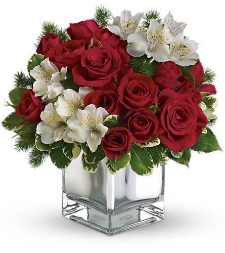Blushing bouquet - by Seulberger's Florist &amp; Gifts - Have yourself a modern little Christmas with red roses and white alstroemeria in a charmingly contemporary silver cube. After the holidays you can use the vase to add pizzazz to bouquets year-round. The stylish Christmas flower arrangement includes red roses red spray roses and white alstroemeria accented with pittosporum and ming fern.Approximately 11 1/2" W x 12" H Orientation: All-Around As Shown : T407-3ADeluxe : T407-3BPremium : T407-3C