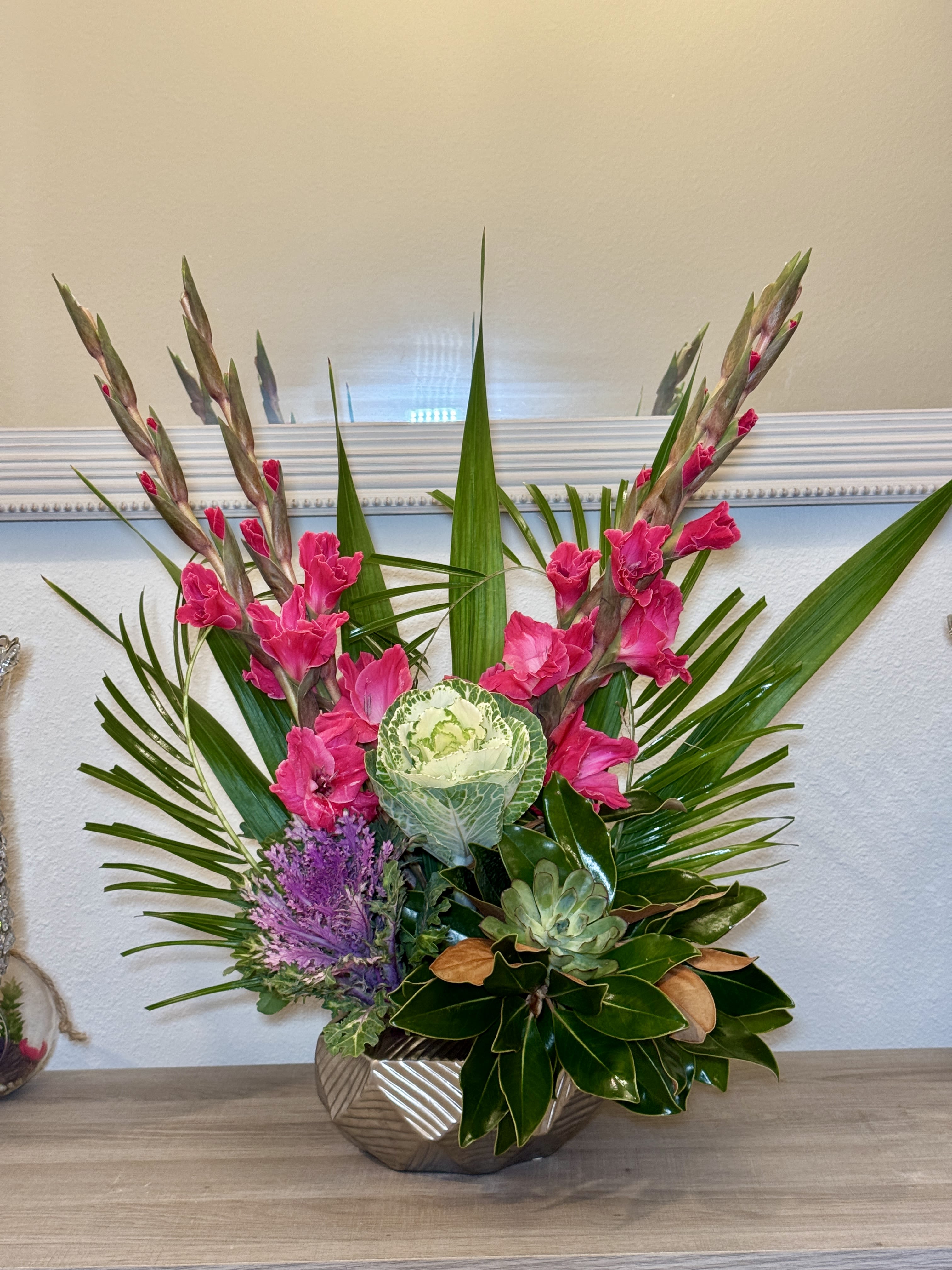 Bliss Perfection  - Make a statement with this oversized floral arrangement featuring elegant pink gladiolus paired with stunning, one-of-a-kind greenery. Tall and graceful, this design brings both sophistication and freshness to any space. Perfect as an impressive centerpiece for a business office or as a thoughtful, unforgettable gift for the true flower lover, it blends beauty and uniqueness in every detail.