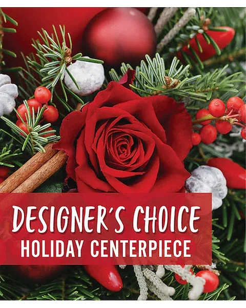 Designer's Choice Holiday Centerpiece - A unique arrangement made by our artisans using the freshest flowers of the day. This product consists of seasonal, market-fresh flowers, which will vary by the day. PLEASE NOTE: Designer's Choice product image does not necessarily reflect the finished item.
