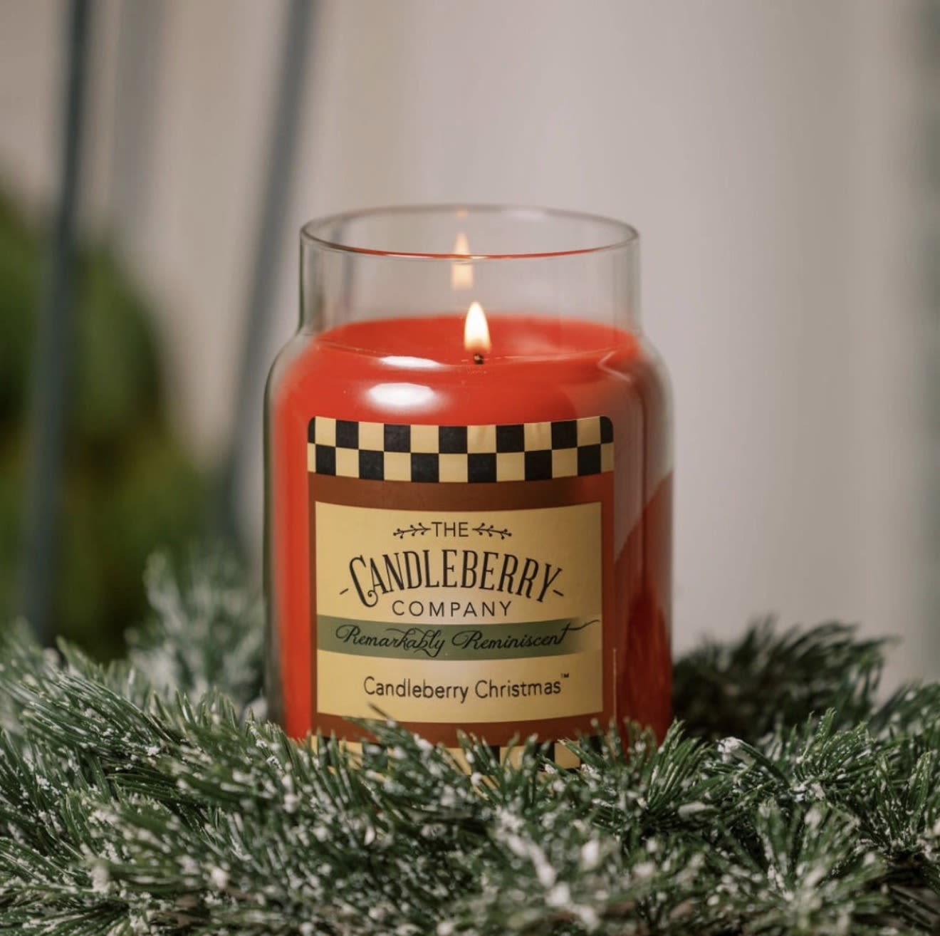 Candleberry Christmas™ - Large Jar Candle - Description: This top-selling scent is a tart cranberry mixed with seasonal spices and powerful bayberry. Candleberry Christmas is an absolute house-filler, and a scent that many homes will not go the holiday season without!  Scent Notes: Top: Tart Cranberry, Cinnamon Stick, Holly Berry Middle: Bay Leaf, Apple Peel, Clove Bud Base: Siberian Fir Needle, Tonka Bean, Vanilla Sugar   Product Details: Burn Time: 135-155 hours Wax Info: Soy Blend Wicks: Single wick - 100% lead-free Produced: Proudly Made in the USA Formula: Made with Advanced Fragrance Technology, Highly Scented, Clean burning